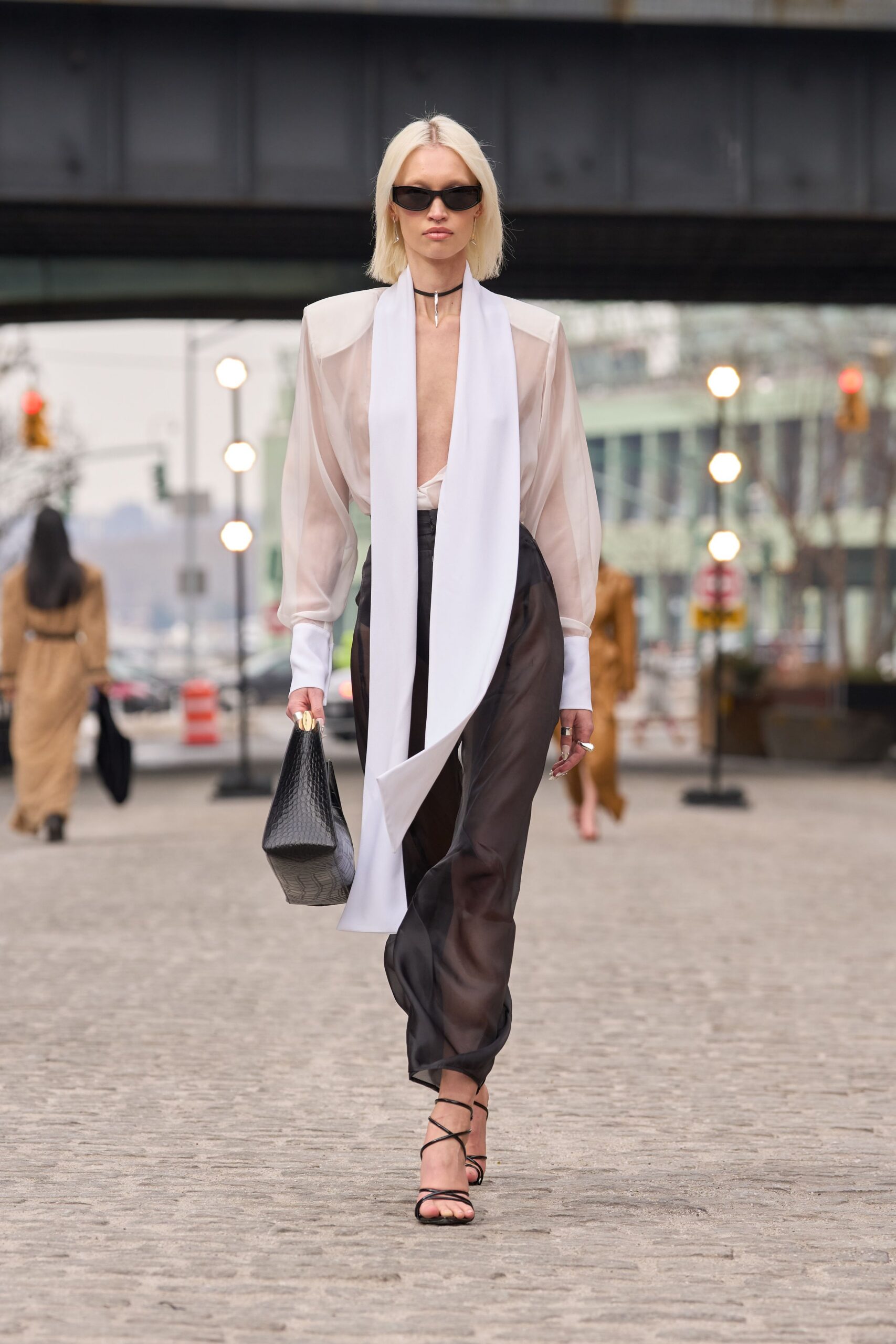 white silk long-sleeve collared fitted sheer flowing blouse