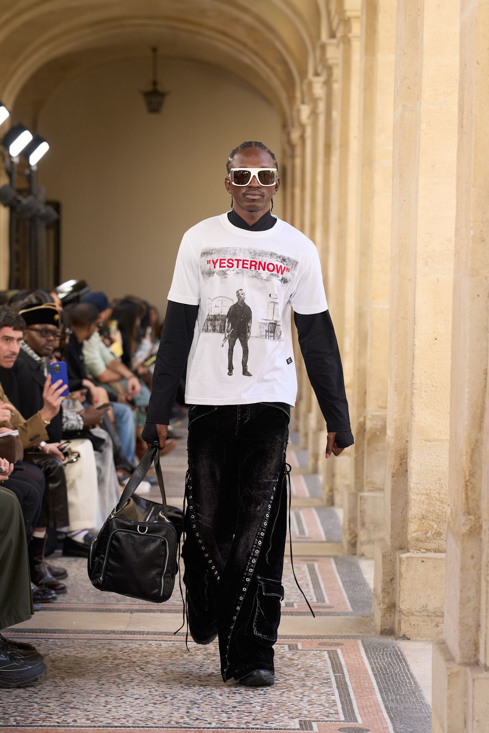 white printed t-shirt with black velvet pants