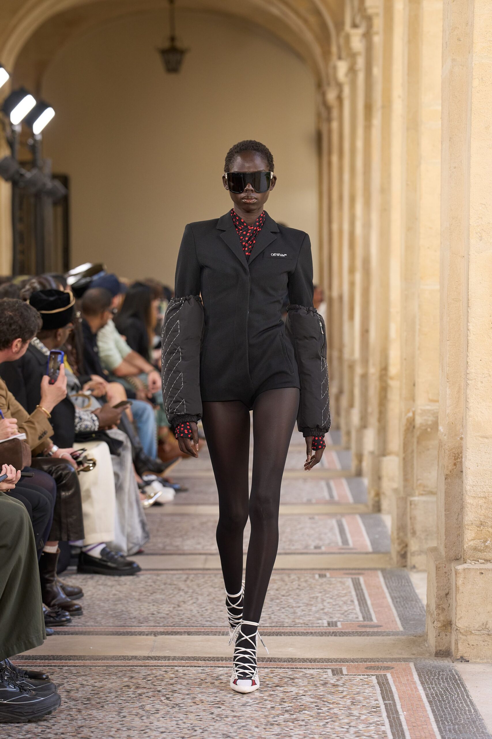 black fitted blazer with shorts