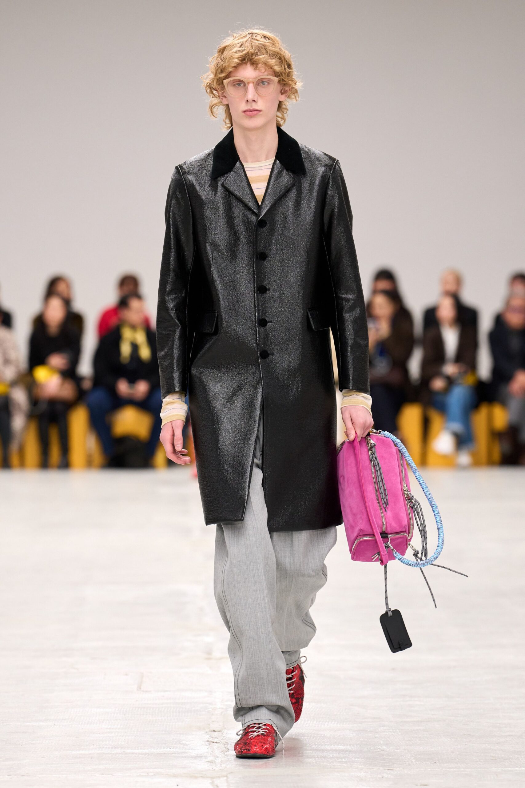 black leather long-sleeve collared fitted buttoned shiny coat
