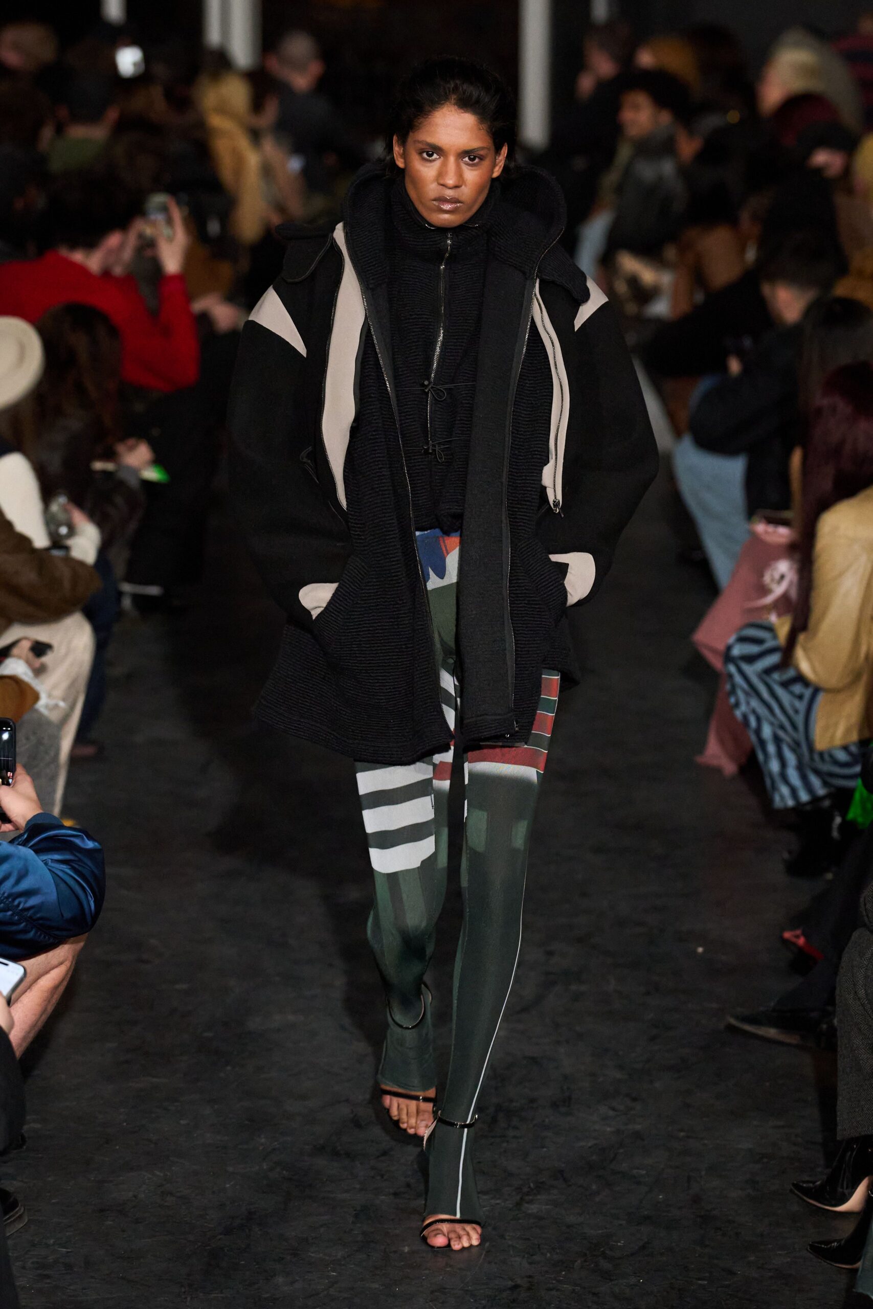 black wool long-sleeve collared oversized zippered layered coat