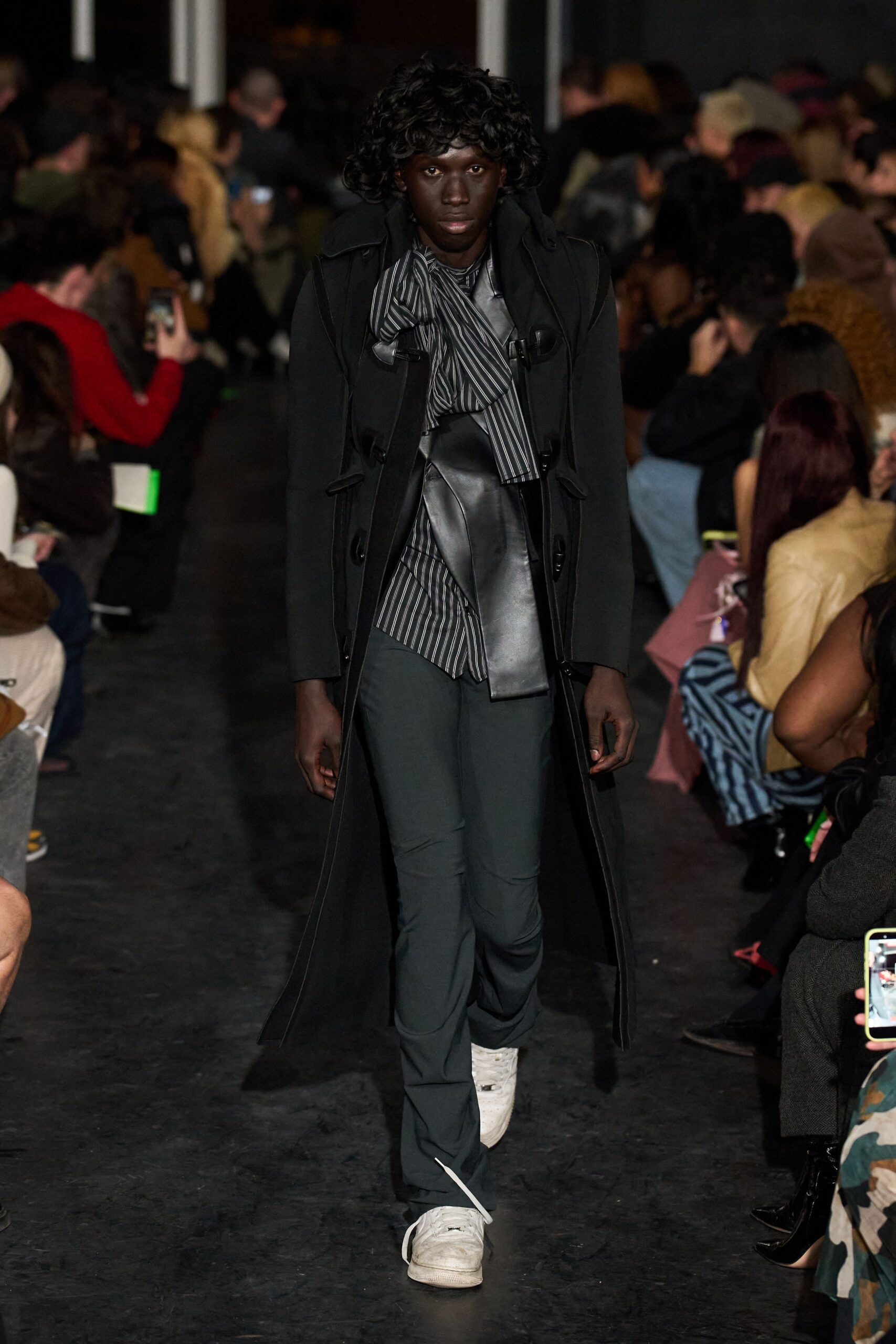 black coat gray striped shirt