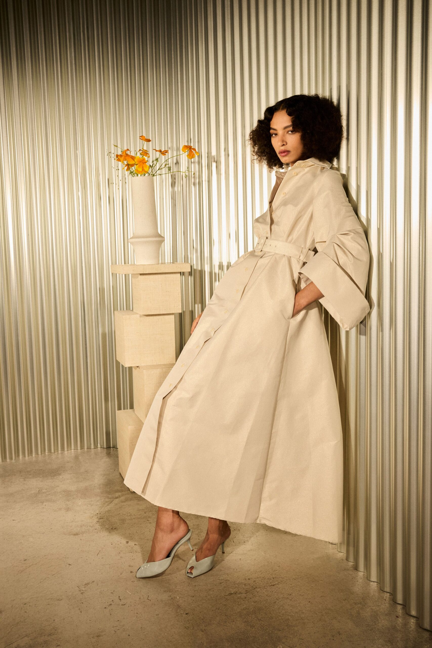 beige cotton long-sleeve collared relaxed belted pleated coat