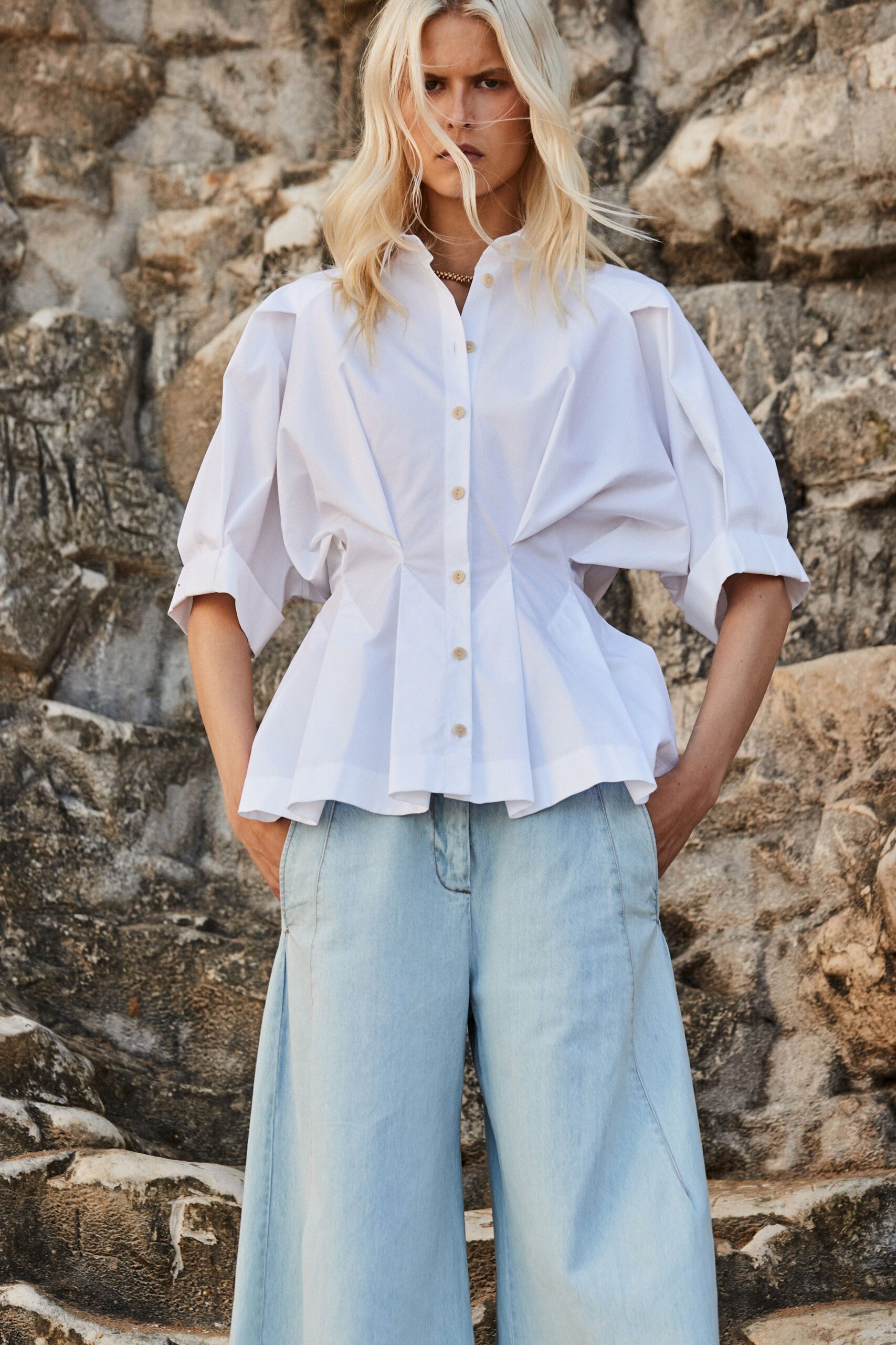 white cotton short-sleeve collared fitted pleated shirt
