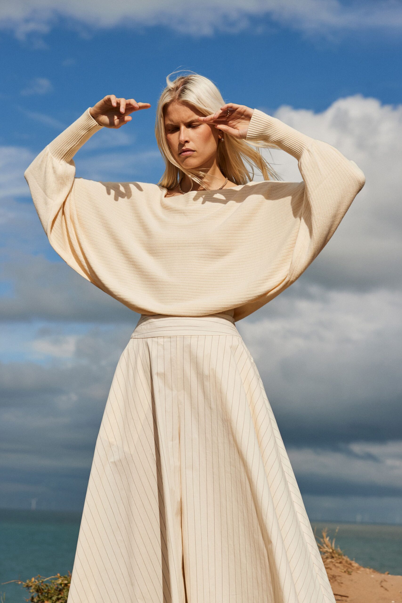 beige cotton long-sleeve collared relaxed pleated top