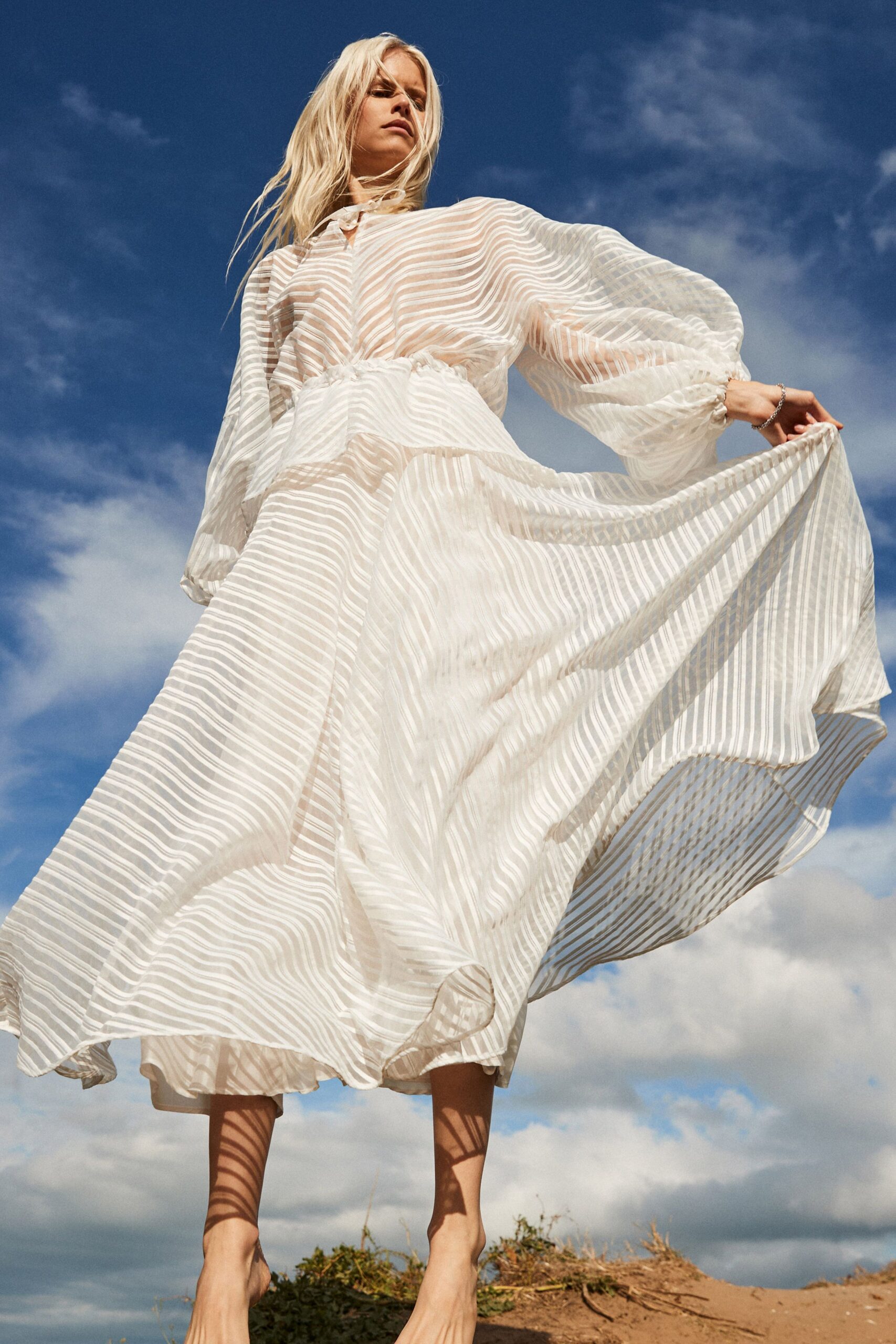 white pleated midi dress