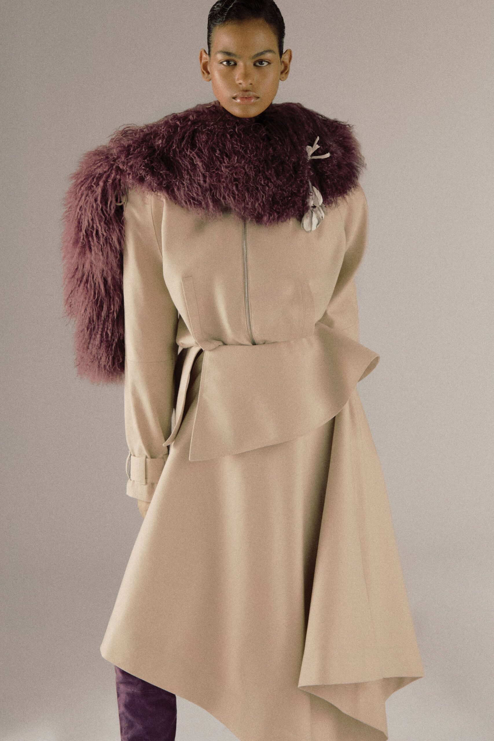beige wool fitted coat with purple scarf