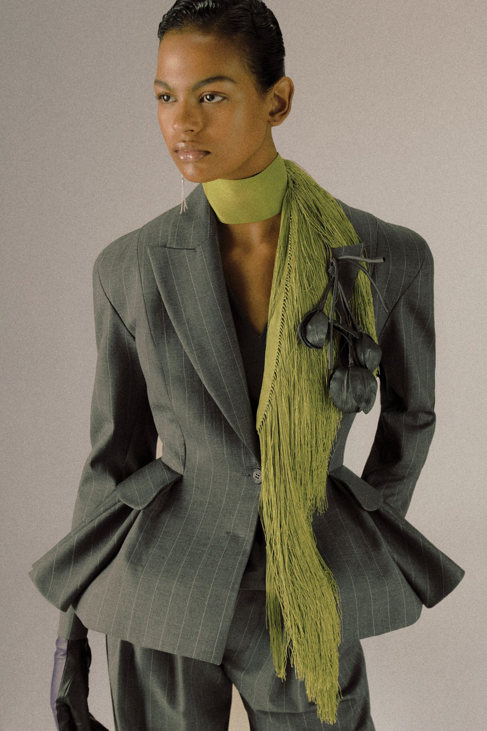 gray striped blazer with accessories