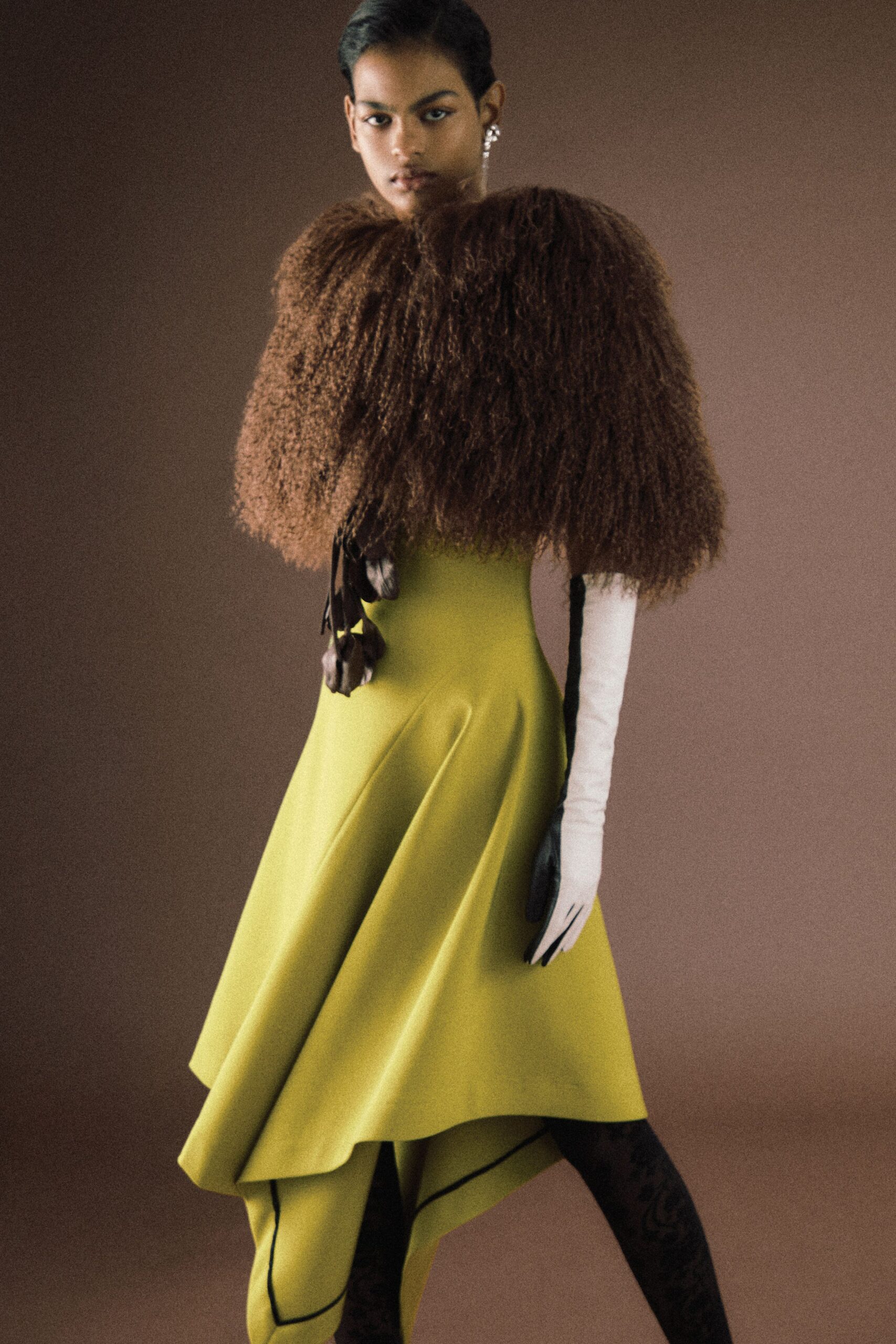 yellow silk asymmetric dress with brown fur cape