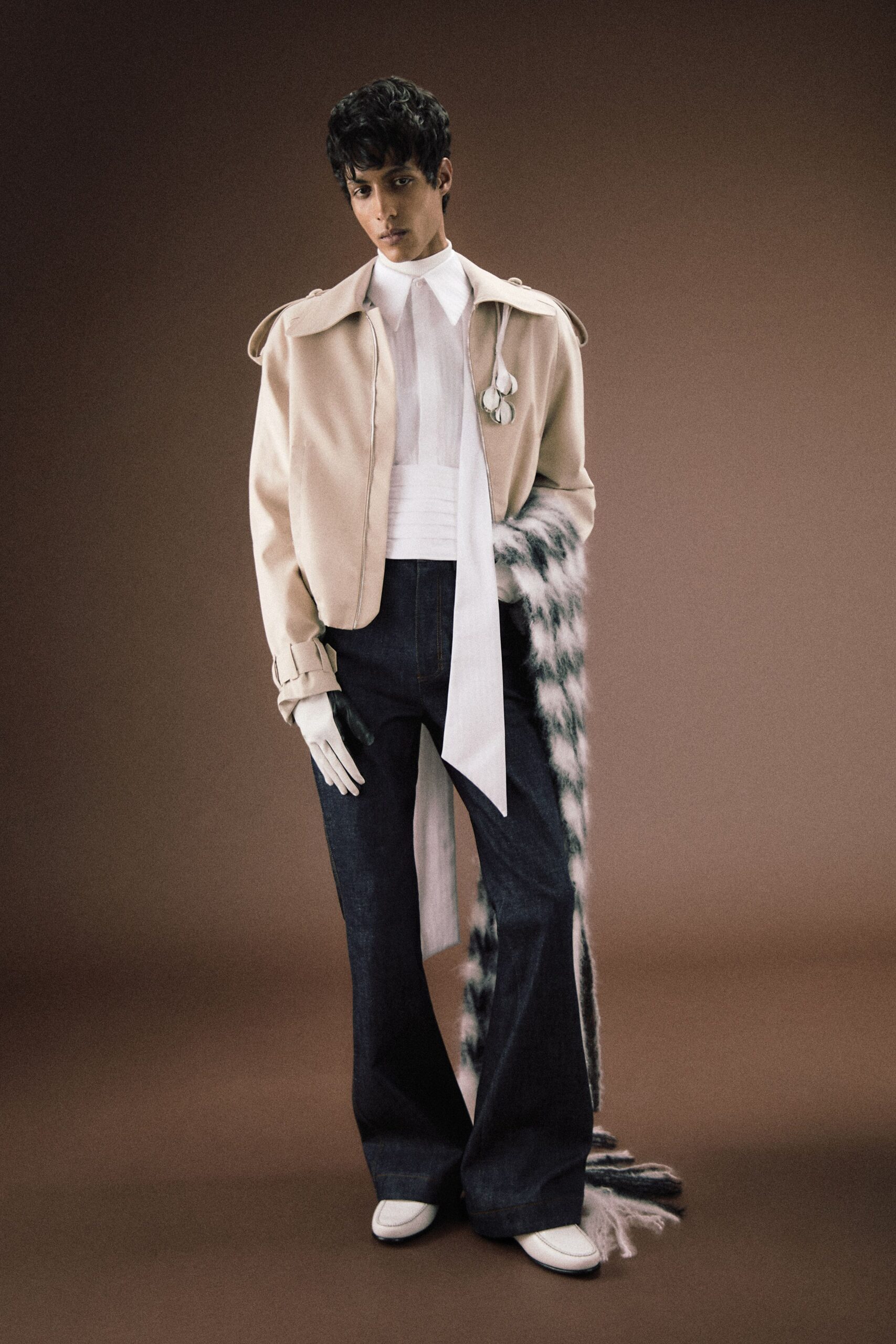 beige structured jacket with denim pants