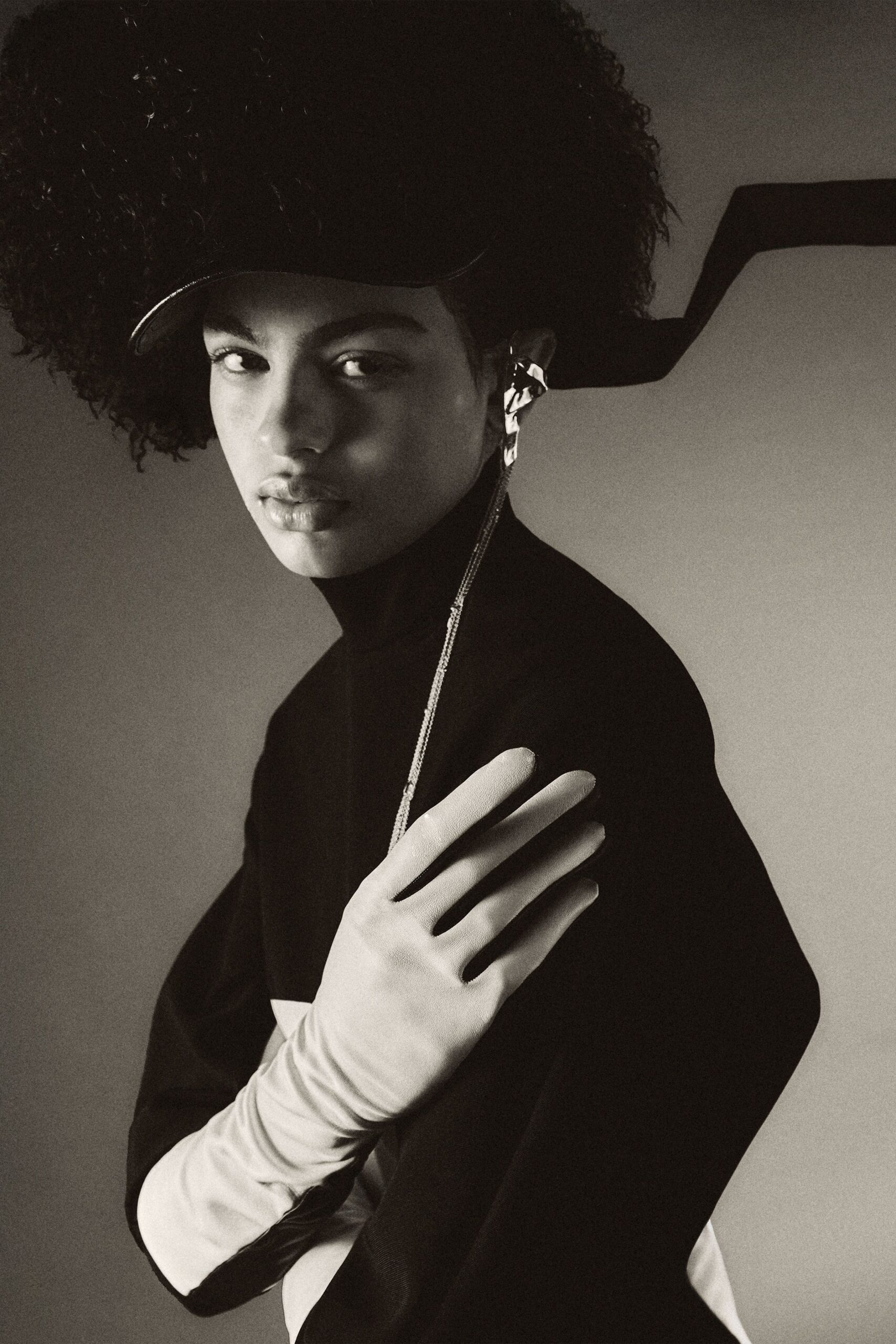 black and white fitted top with gloves