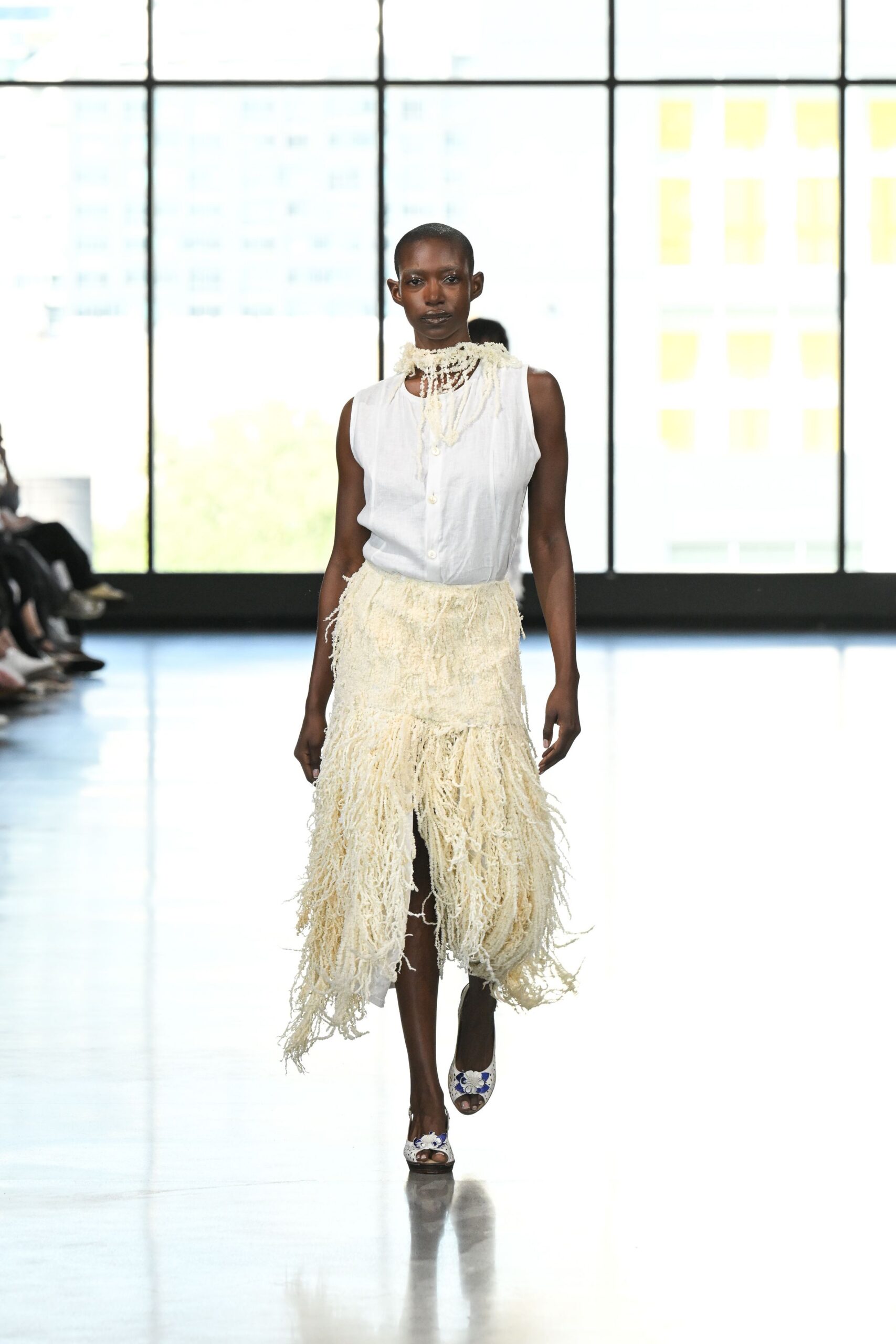 white cotton sleeveless collared fitted ruffled top