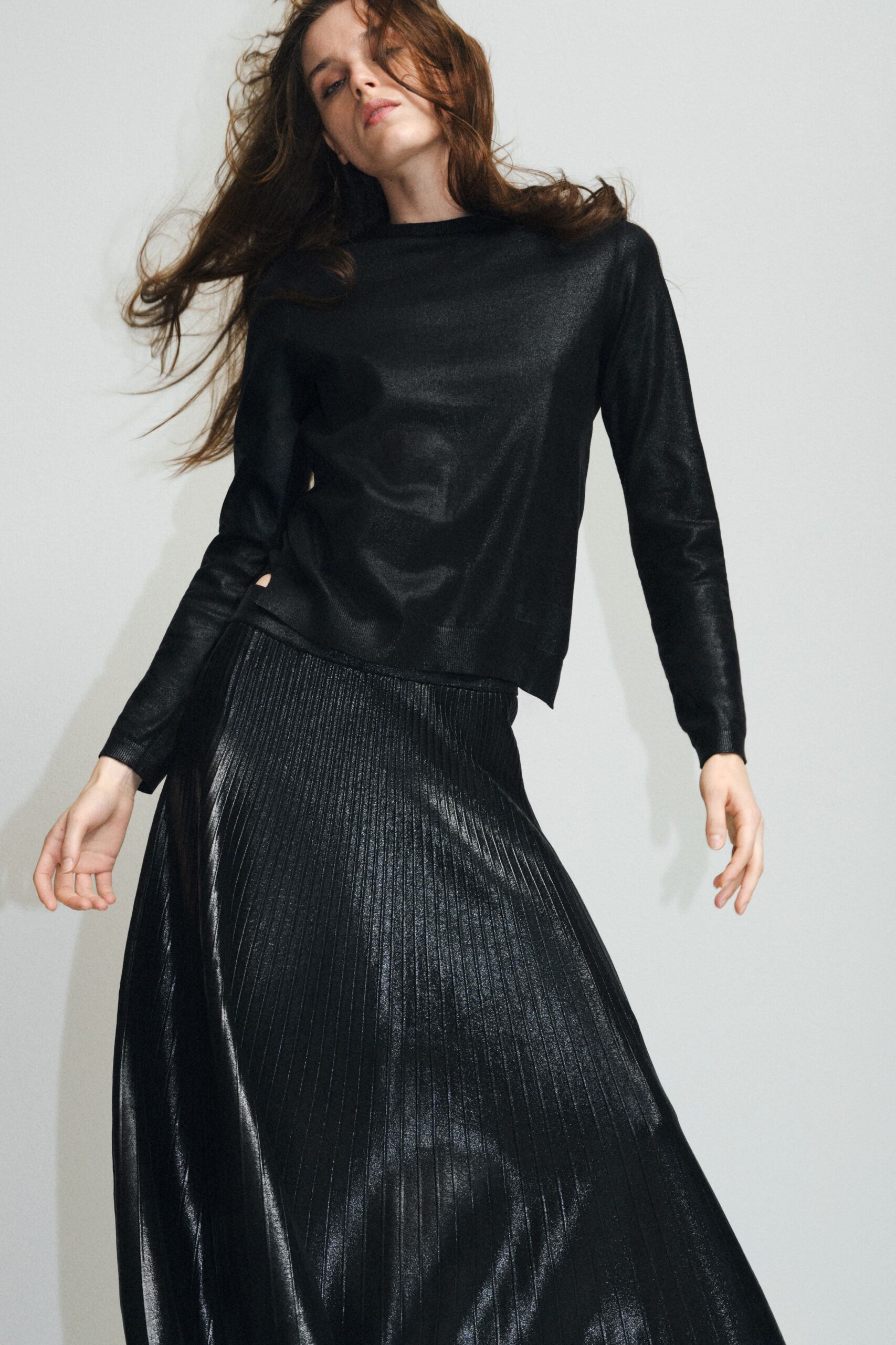 black silk long-sleeve high-neck relaxed textured shiny top