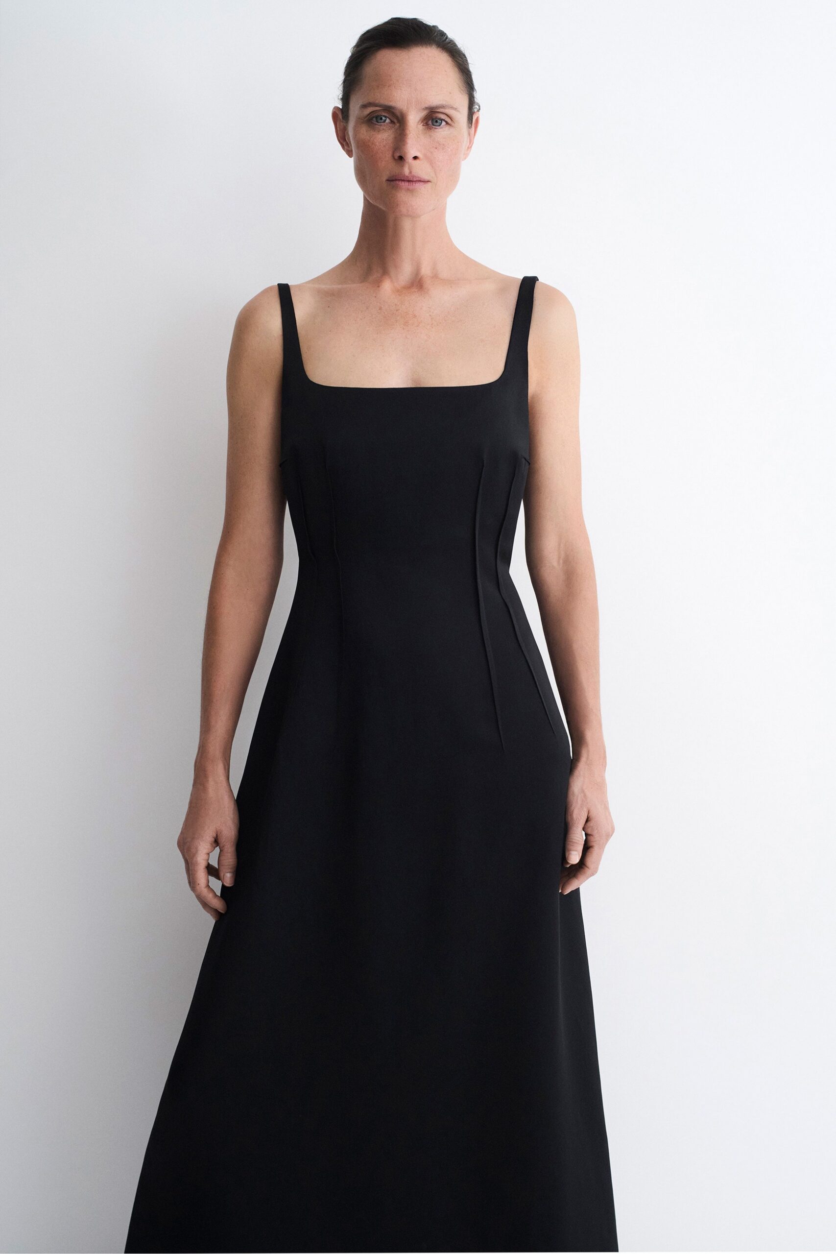 black silk sleeveless gown