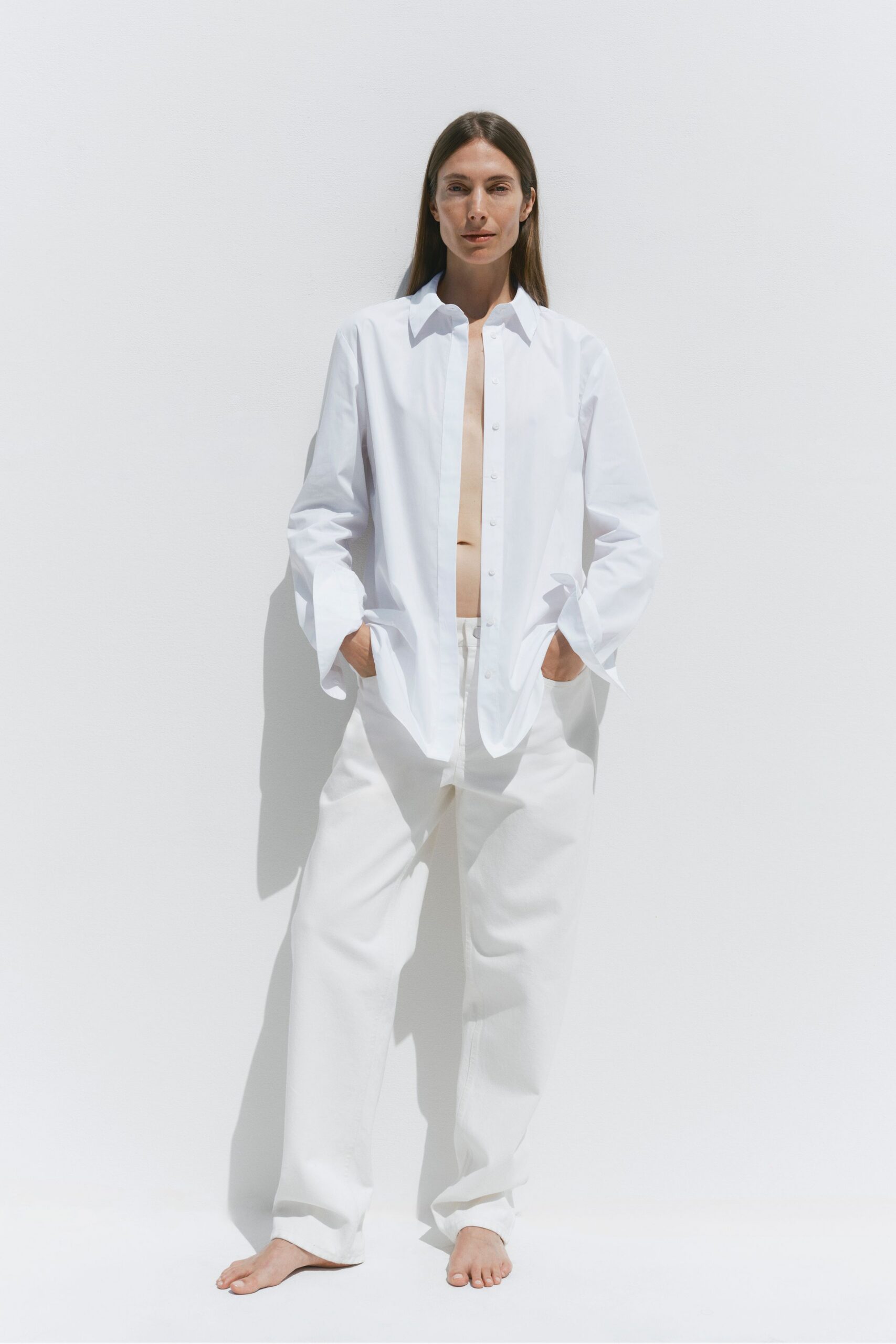 white relaxed shirt and pants