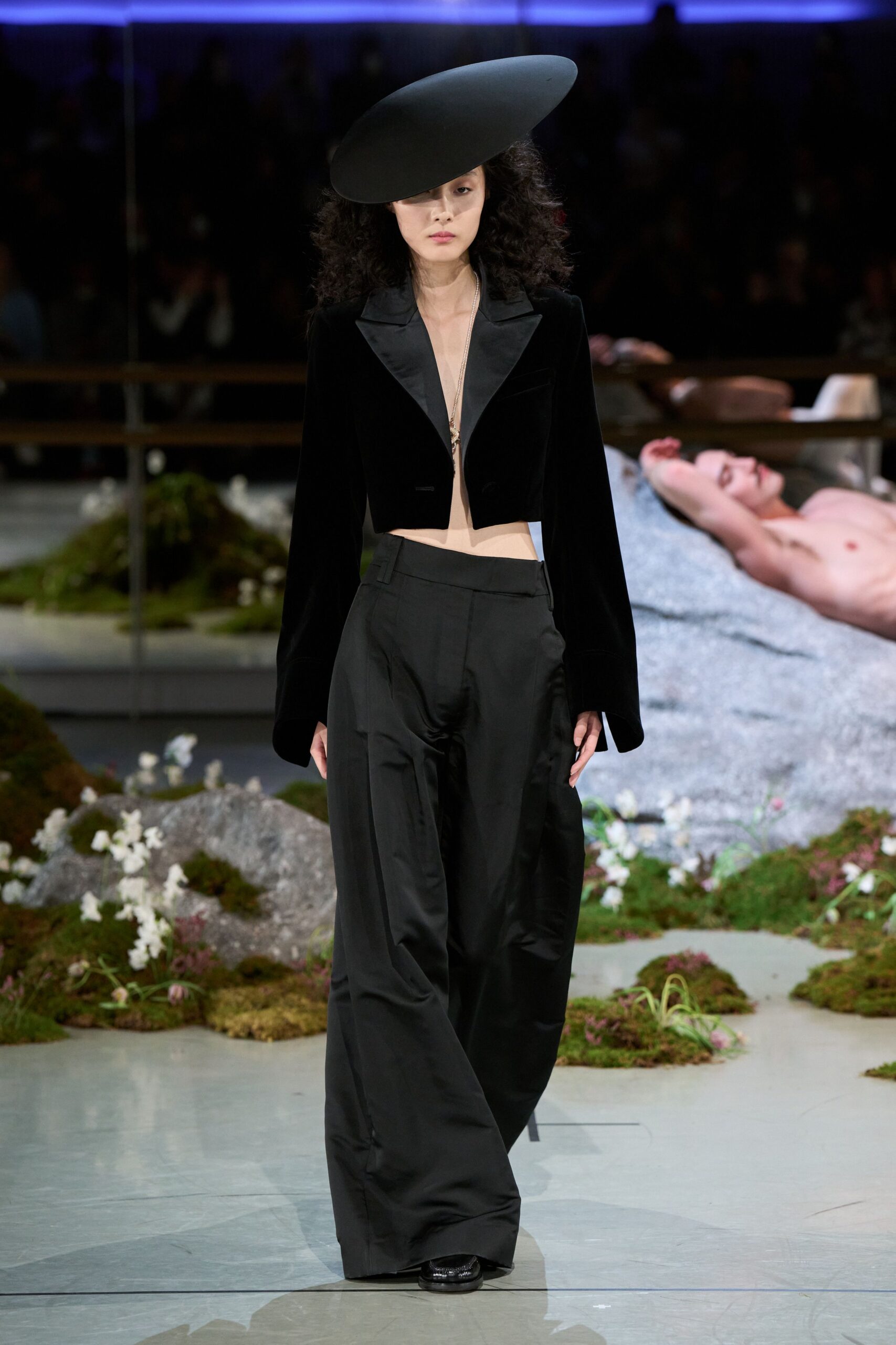 black velvet jacket and wide-leg pants