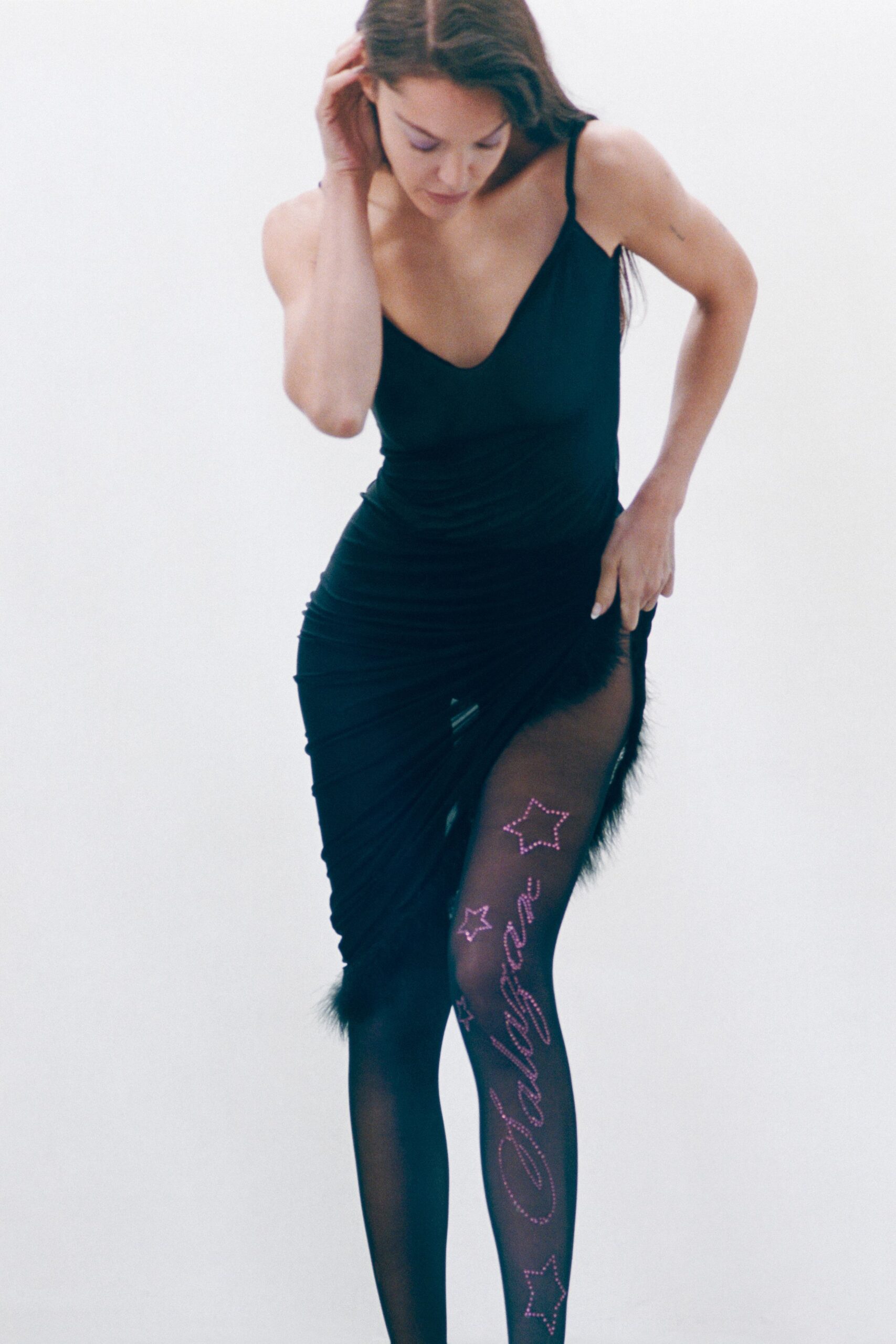 black silk sleeveless v-neck fitted ruched sheer dress