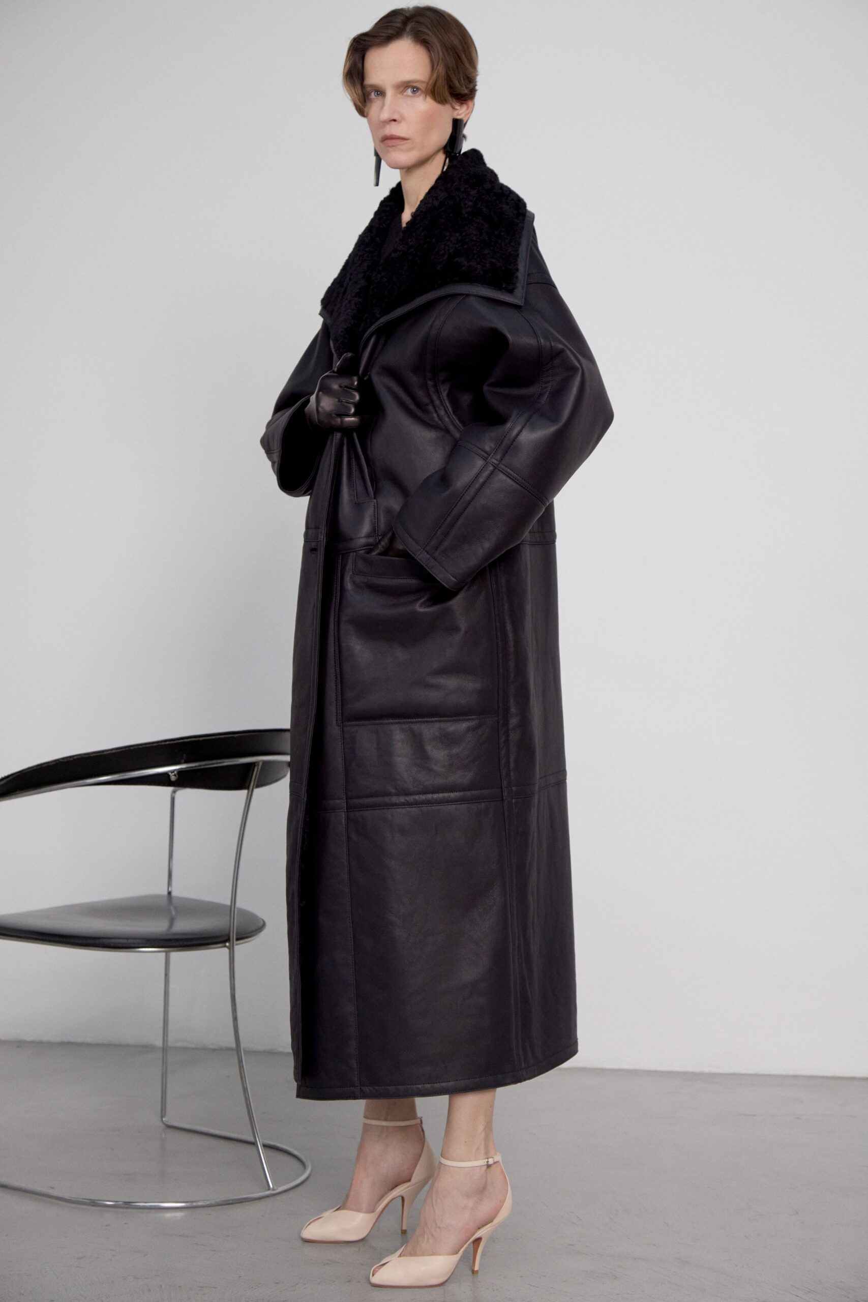 black leather long-sleeve collared oversized pockets maxi coat