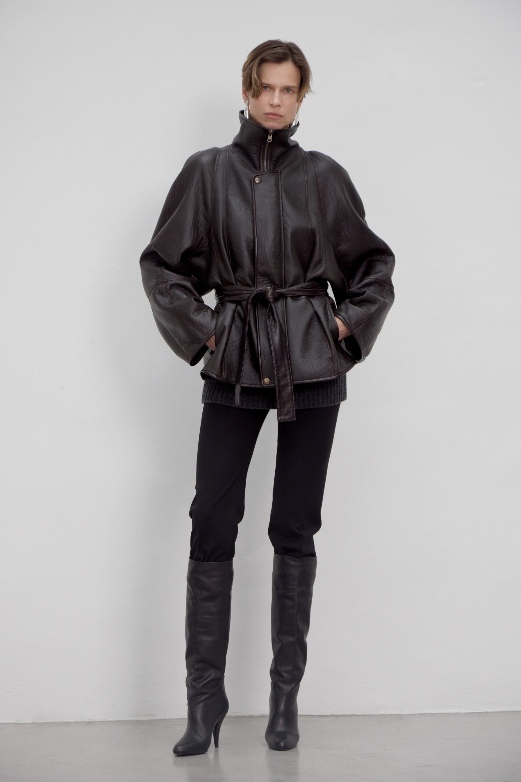 black leather long-sleeve collared oversized belted jacket