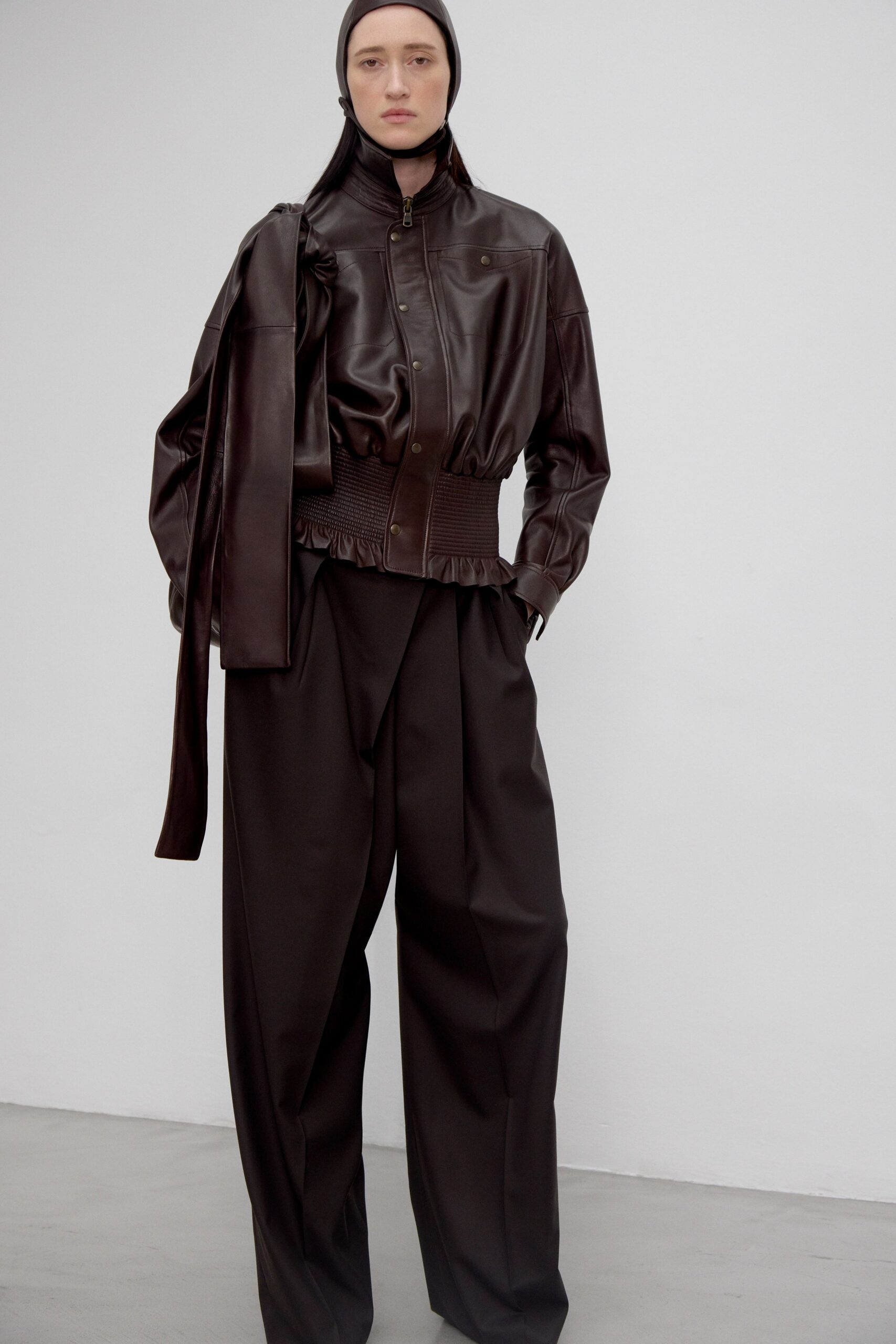 brown leather long-sleeve collared relaxed zippered belted jacket