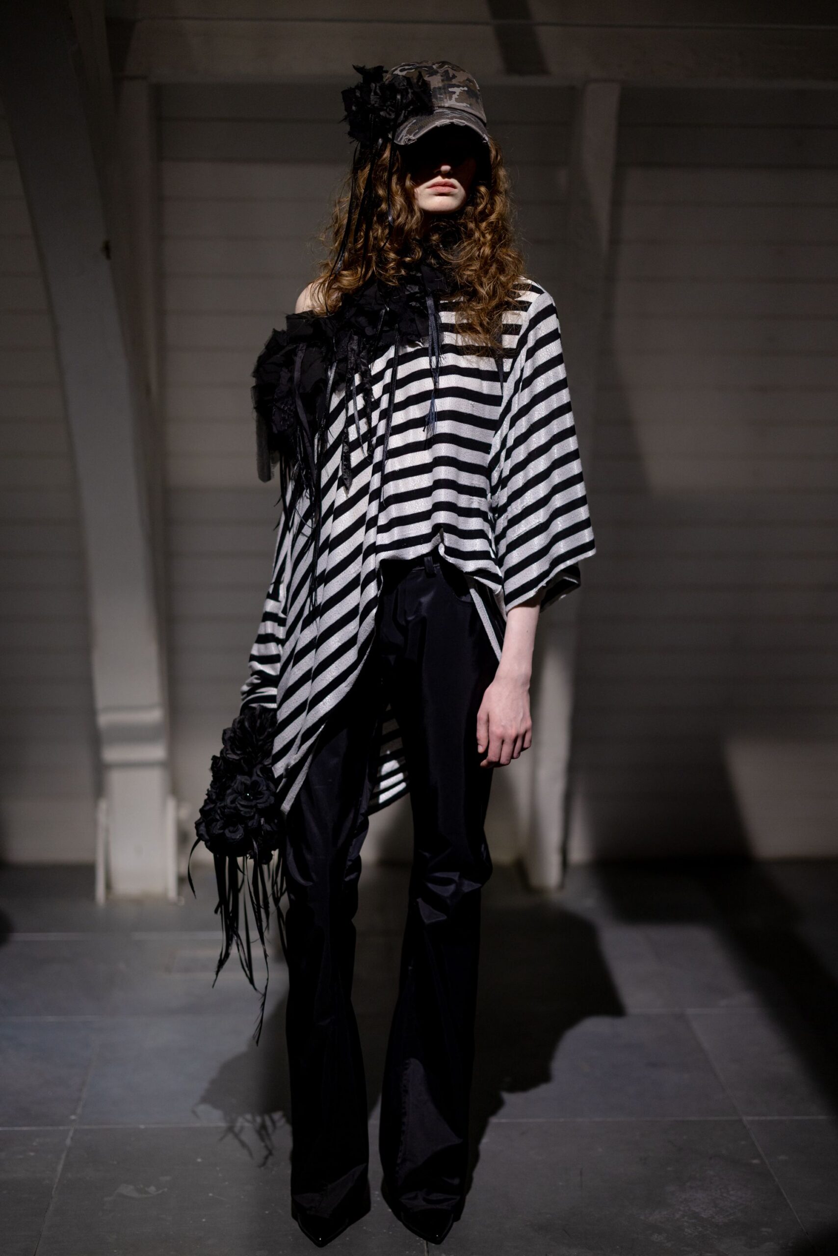 black short-sleeve asymmetric relaxed striped top
