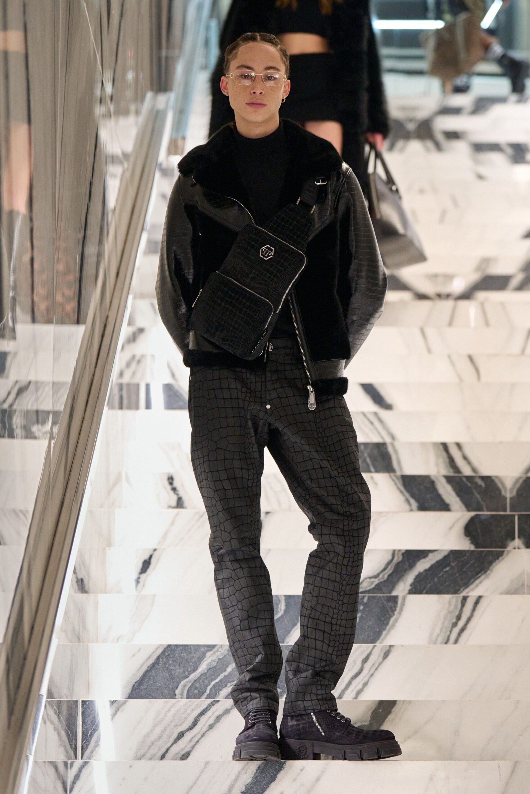 black leather jacket with checked pants