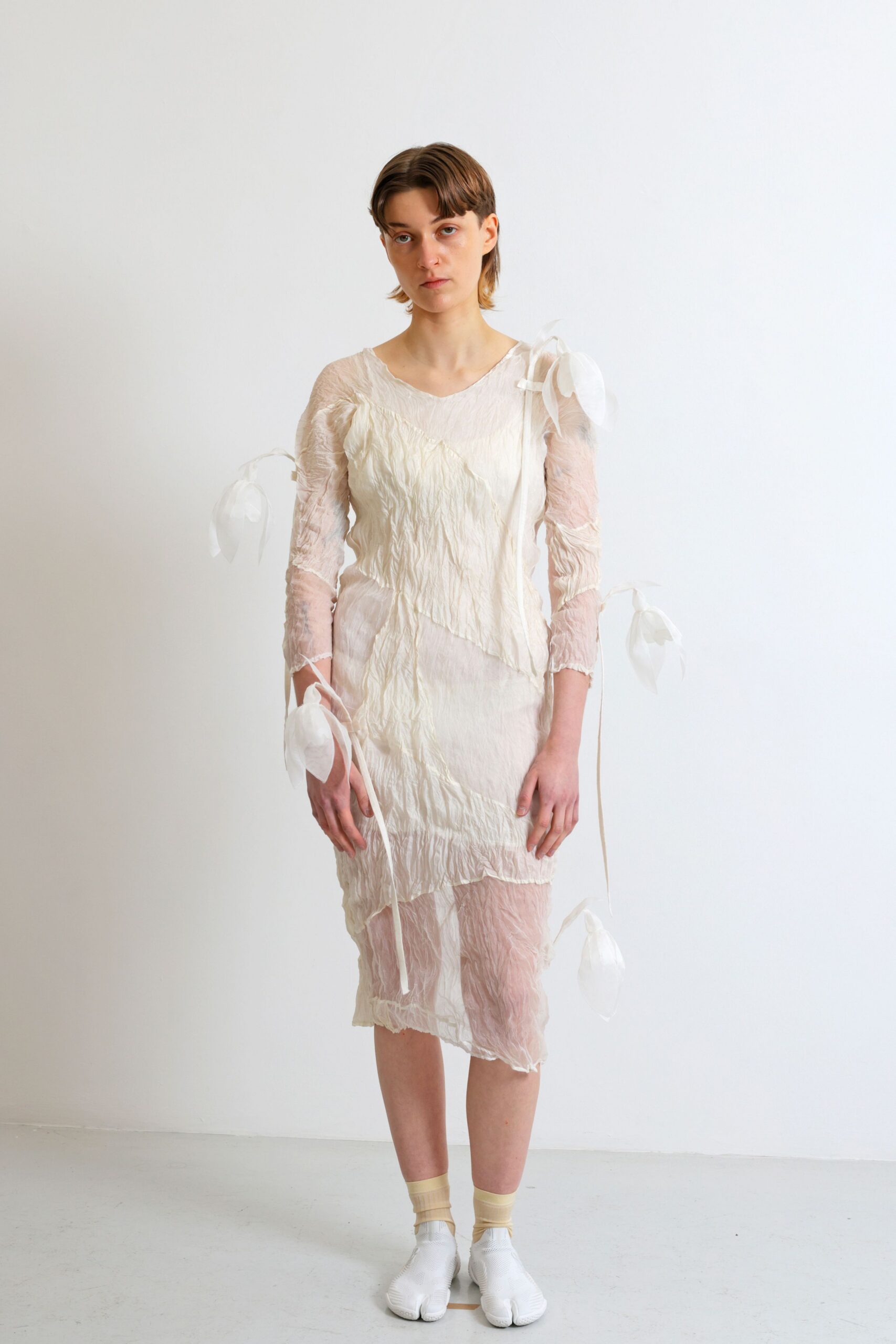white silk long-sleeve v-neck fitted ruffled draped dress