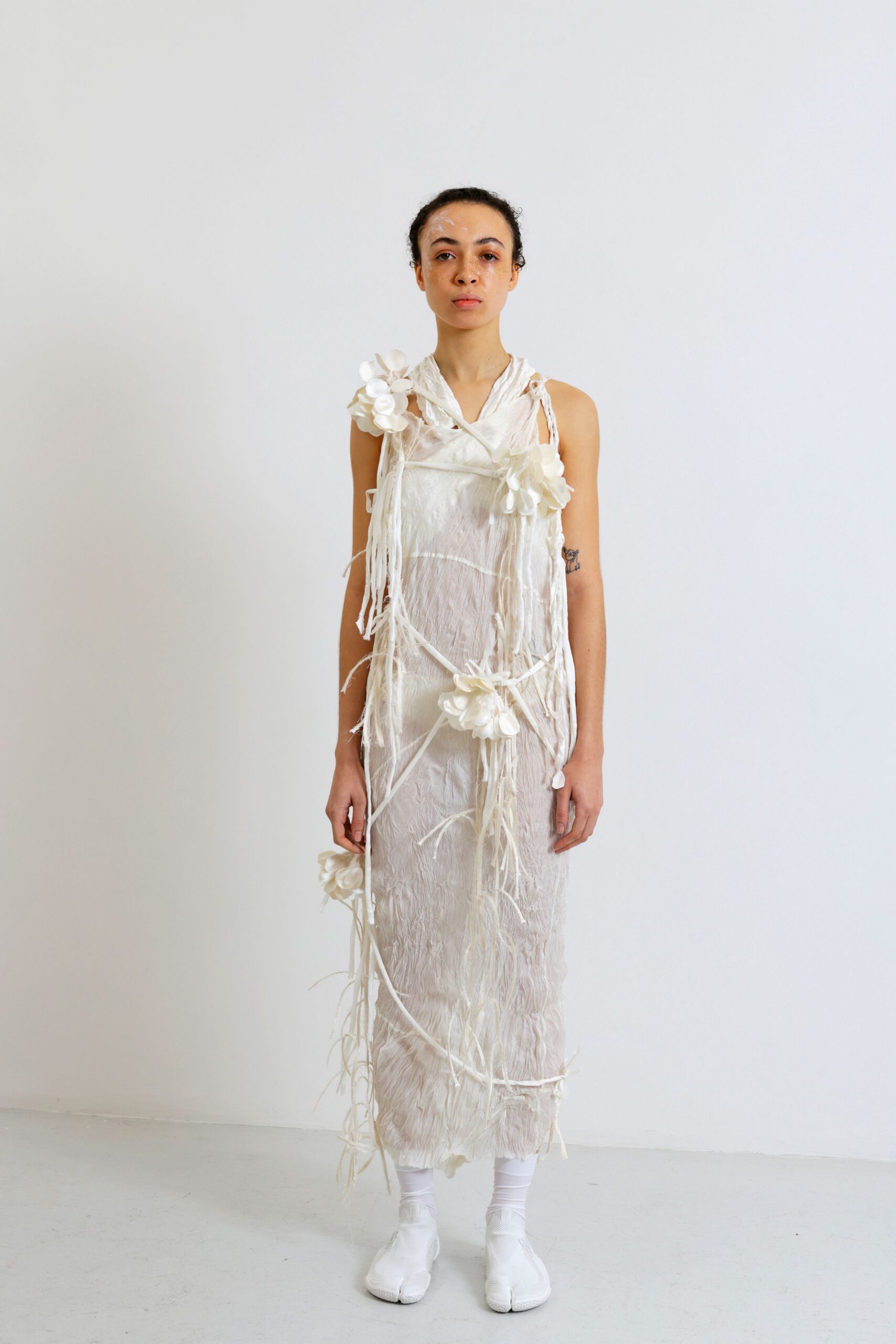 white silk sleeveless v-neck fitted draped embellished dress