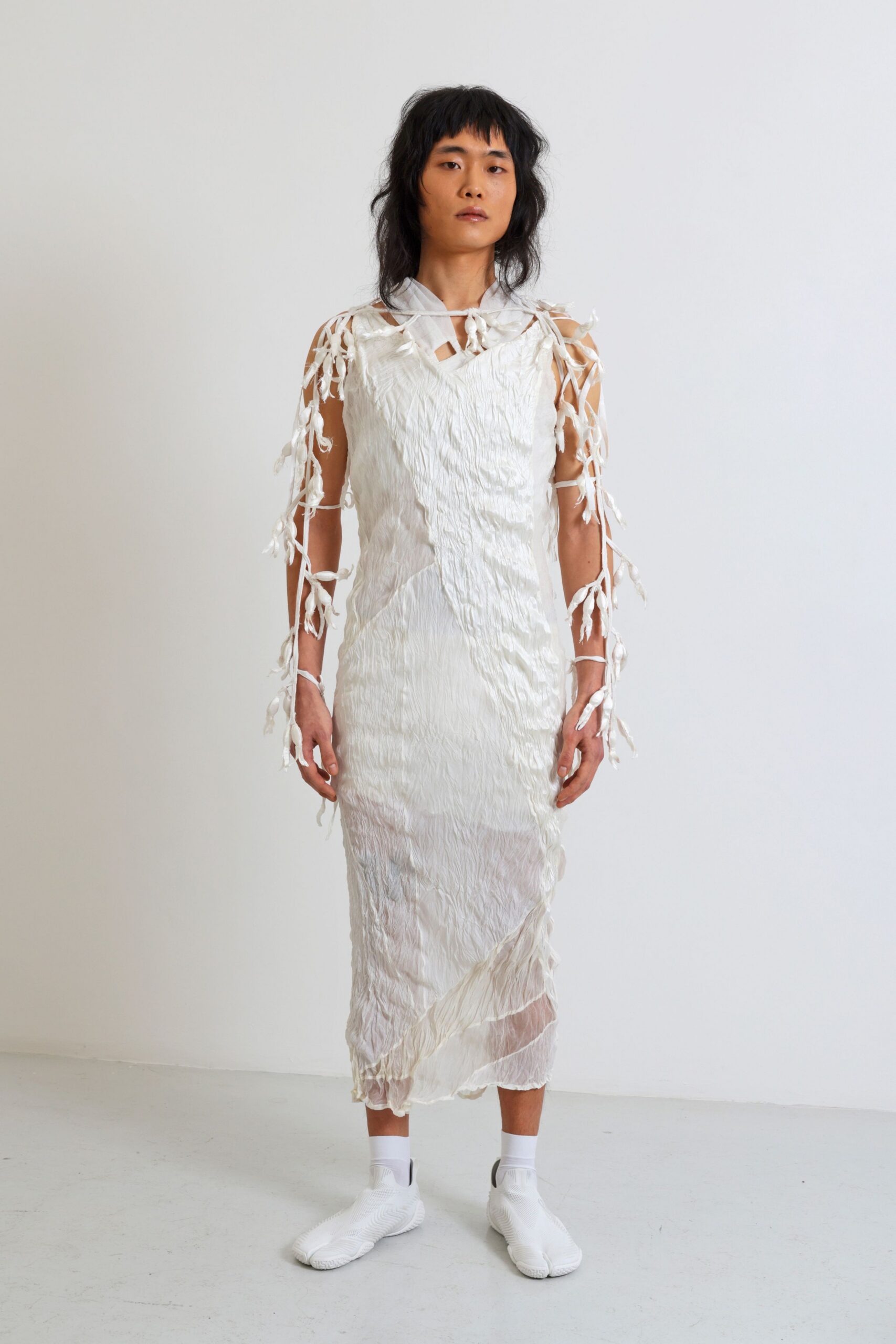 white silk sleeveless high-neck fitted draped fringed dress