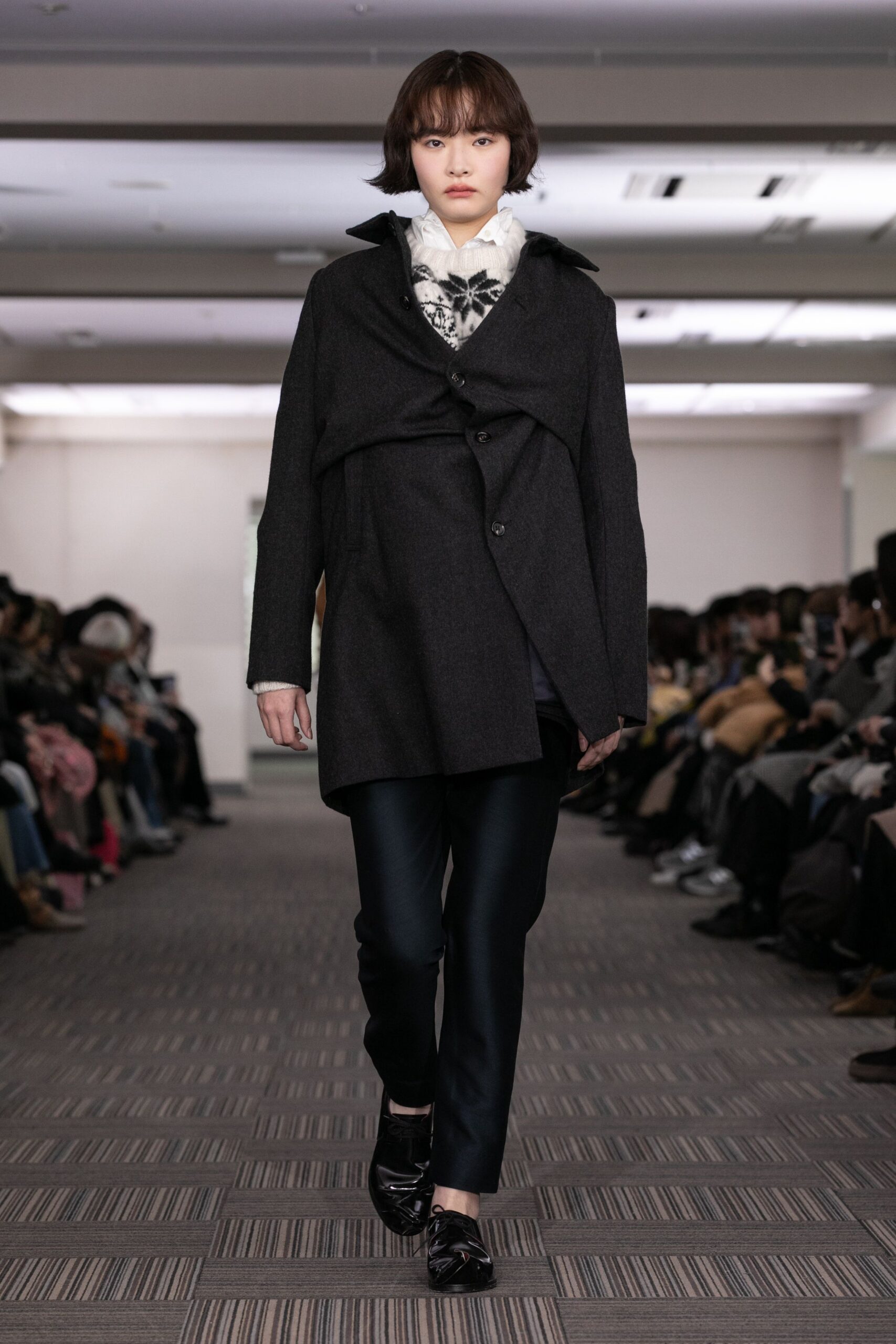 black wool long-sleeve collared structured buttoned coat