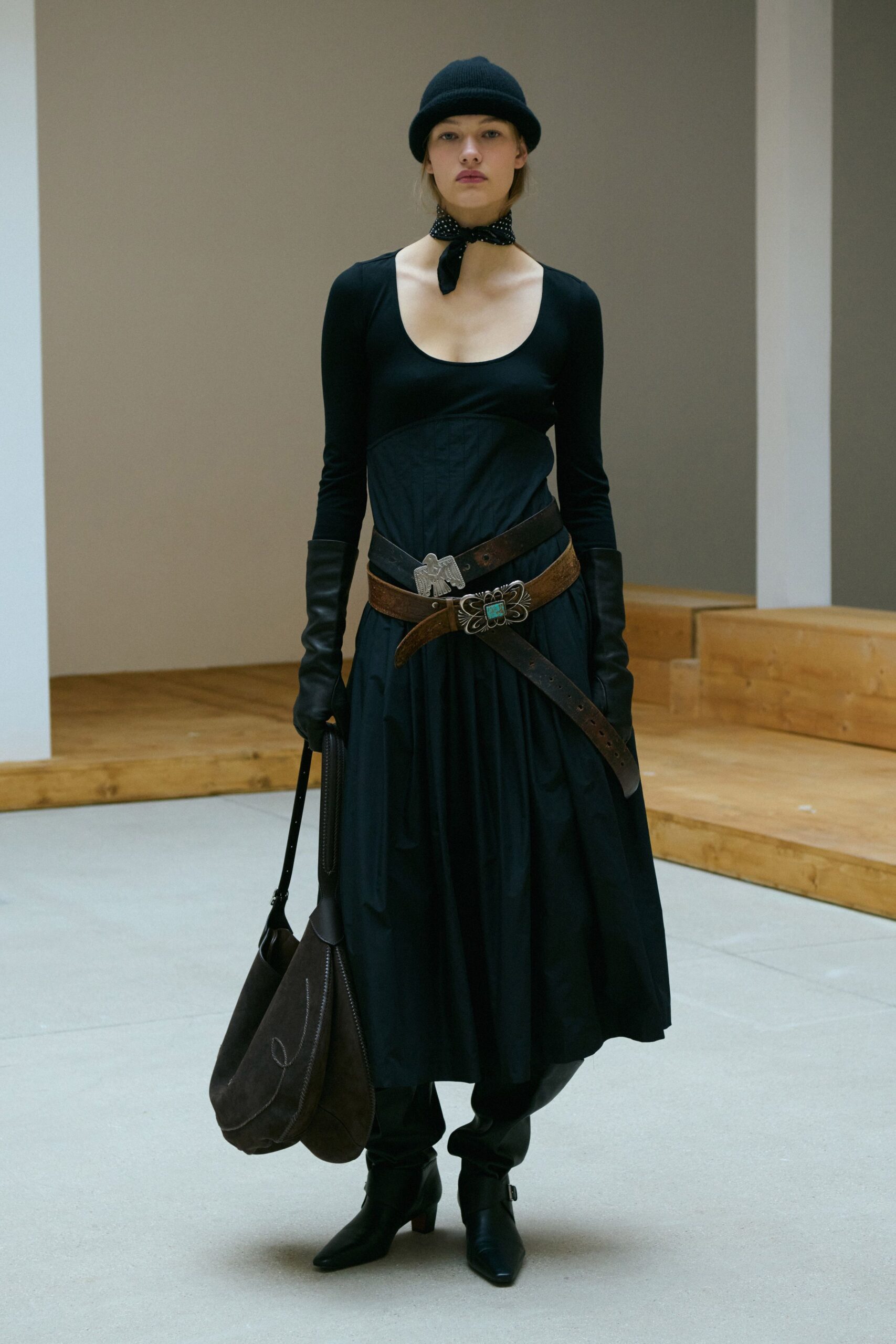 black fitted midi dress with accessories
