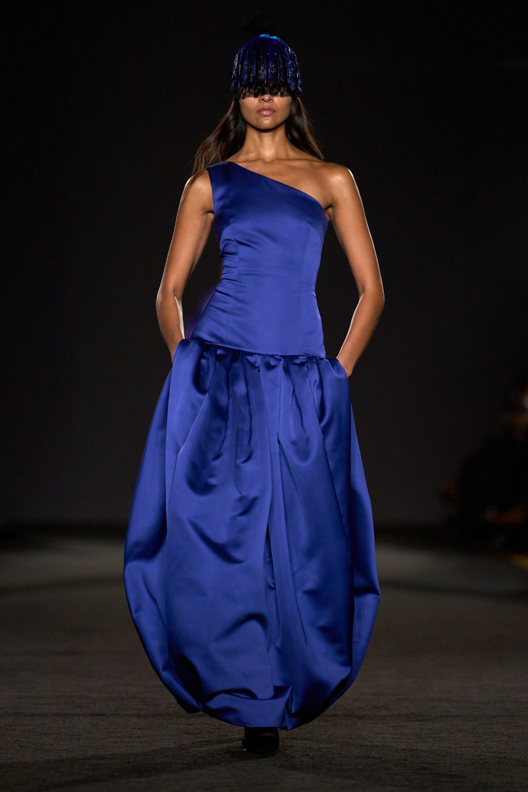 blue silk sleeveless off-shoulder fitted pleated maxi gown