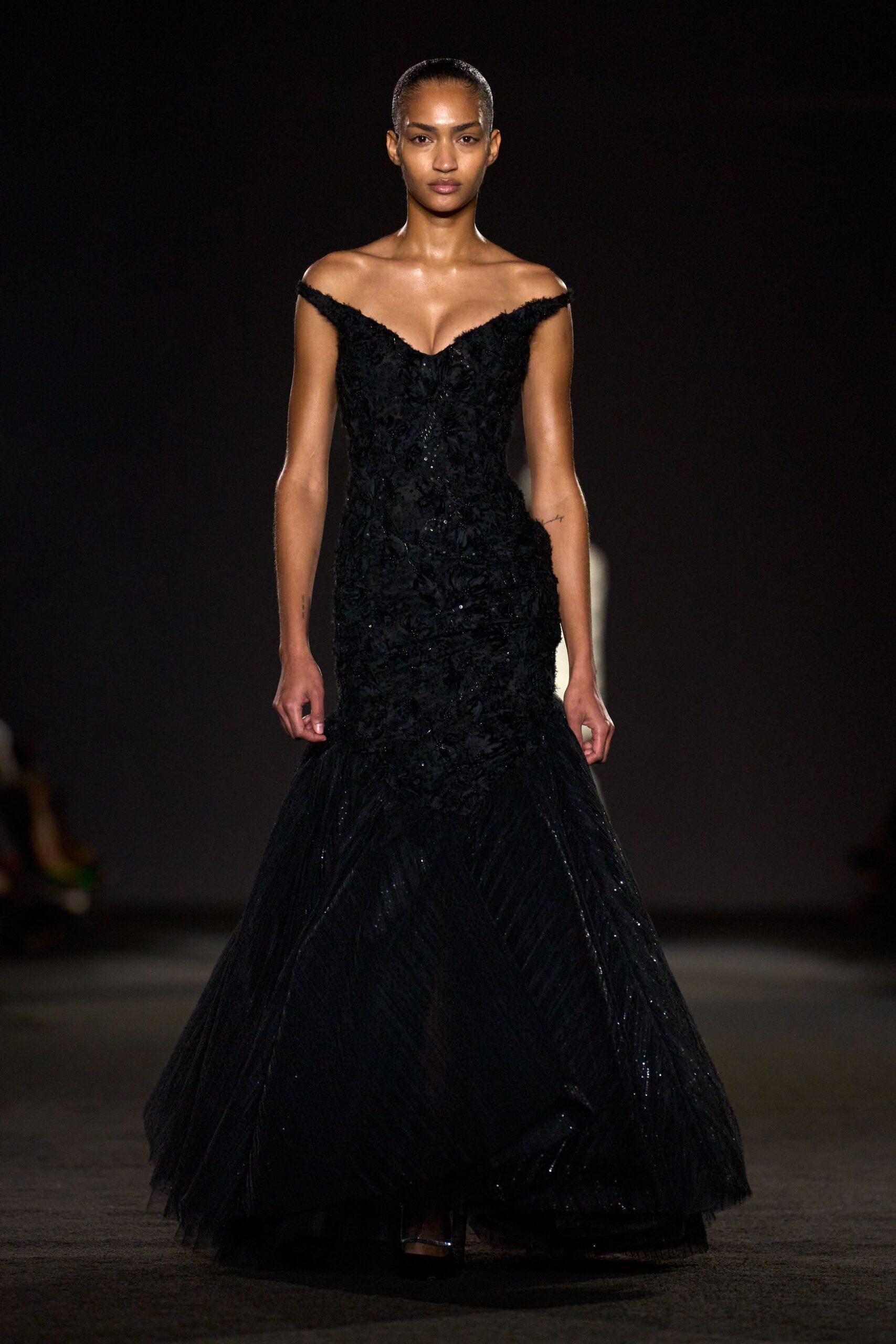 black off-shoulder ruffled gown