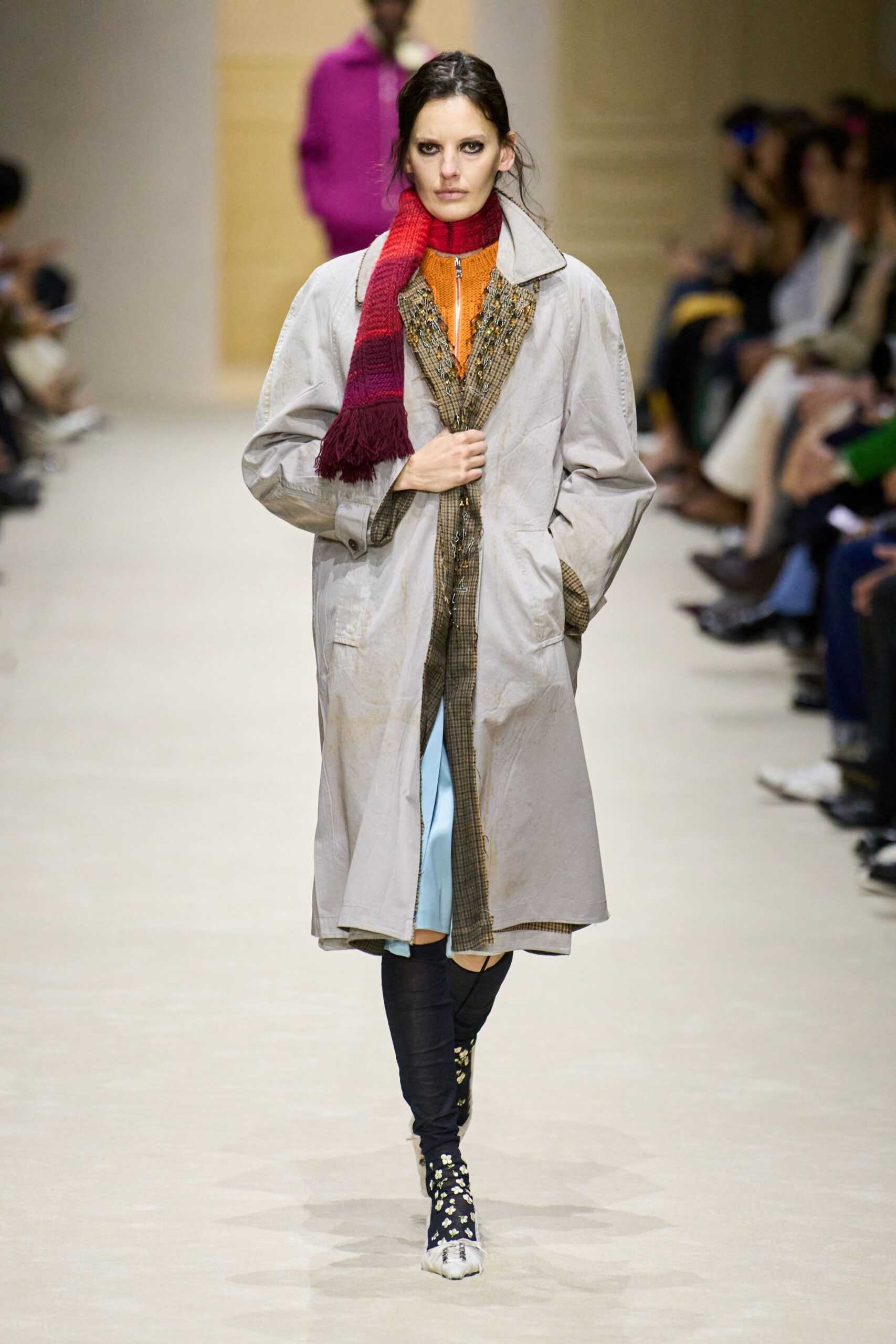 gray coat with orange top