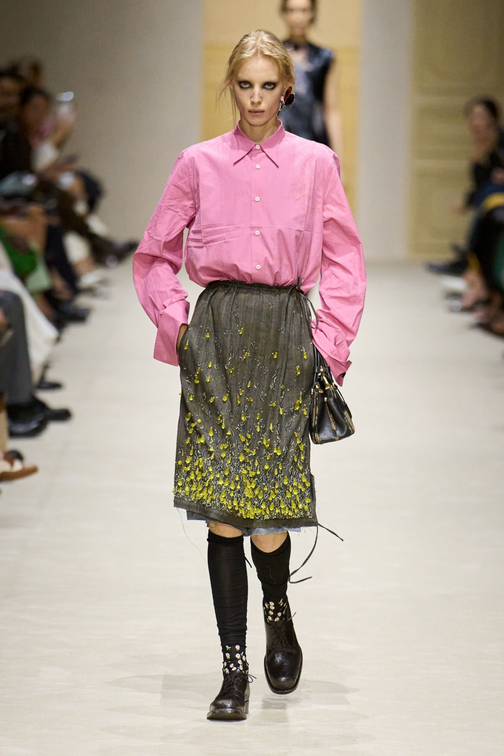 pink shirt gray embroidered skirt