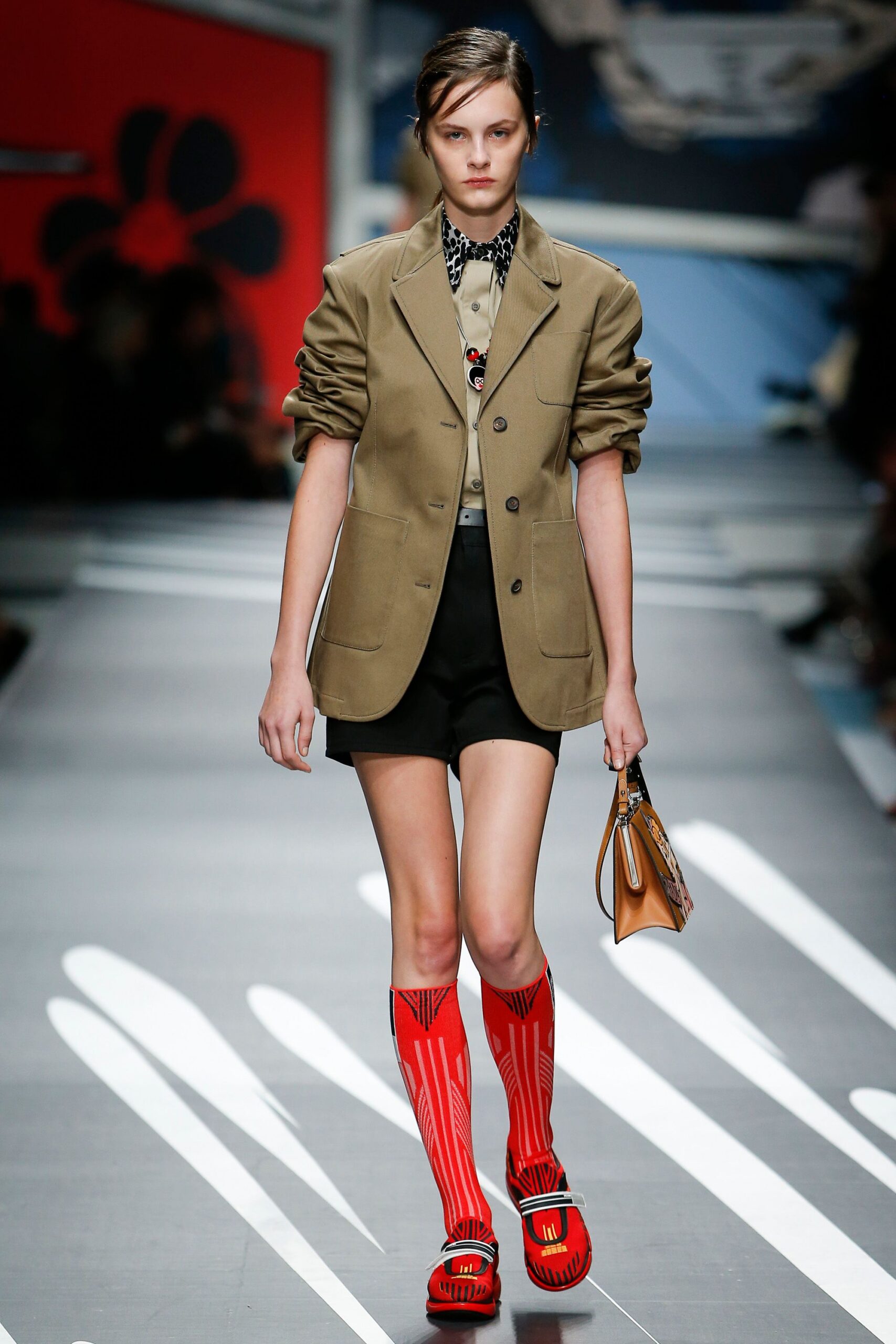 brown blazer with black shorts