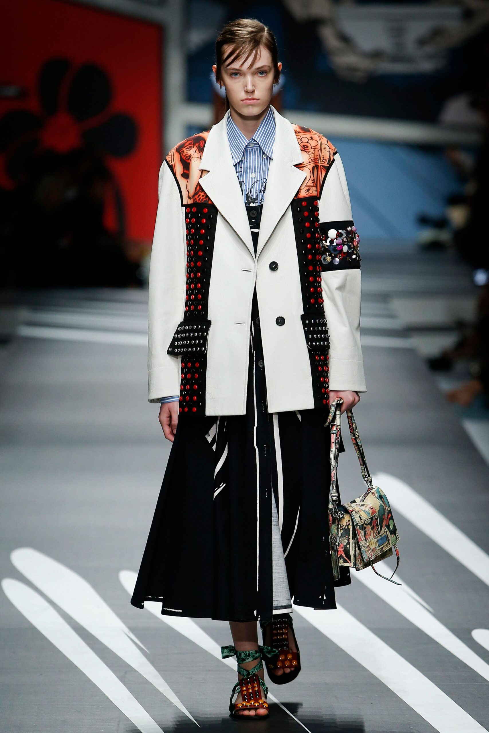 white relaxed coat with pleated skirt