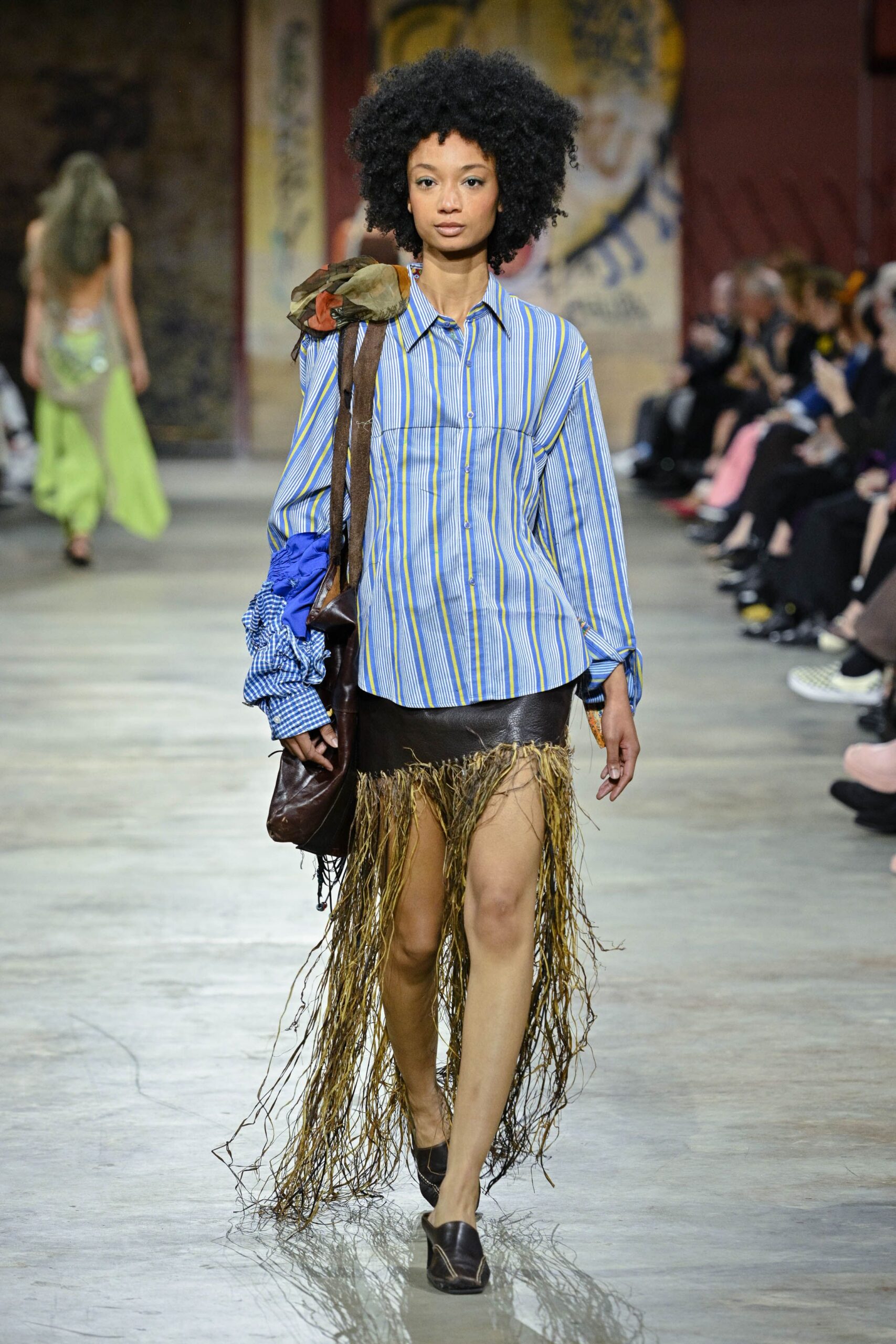 blue striped shirt black fringed skirt