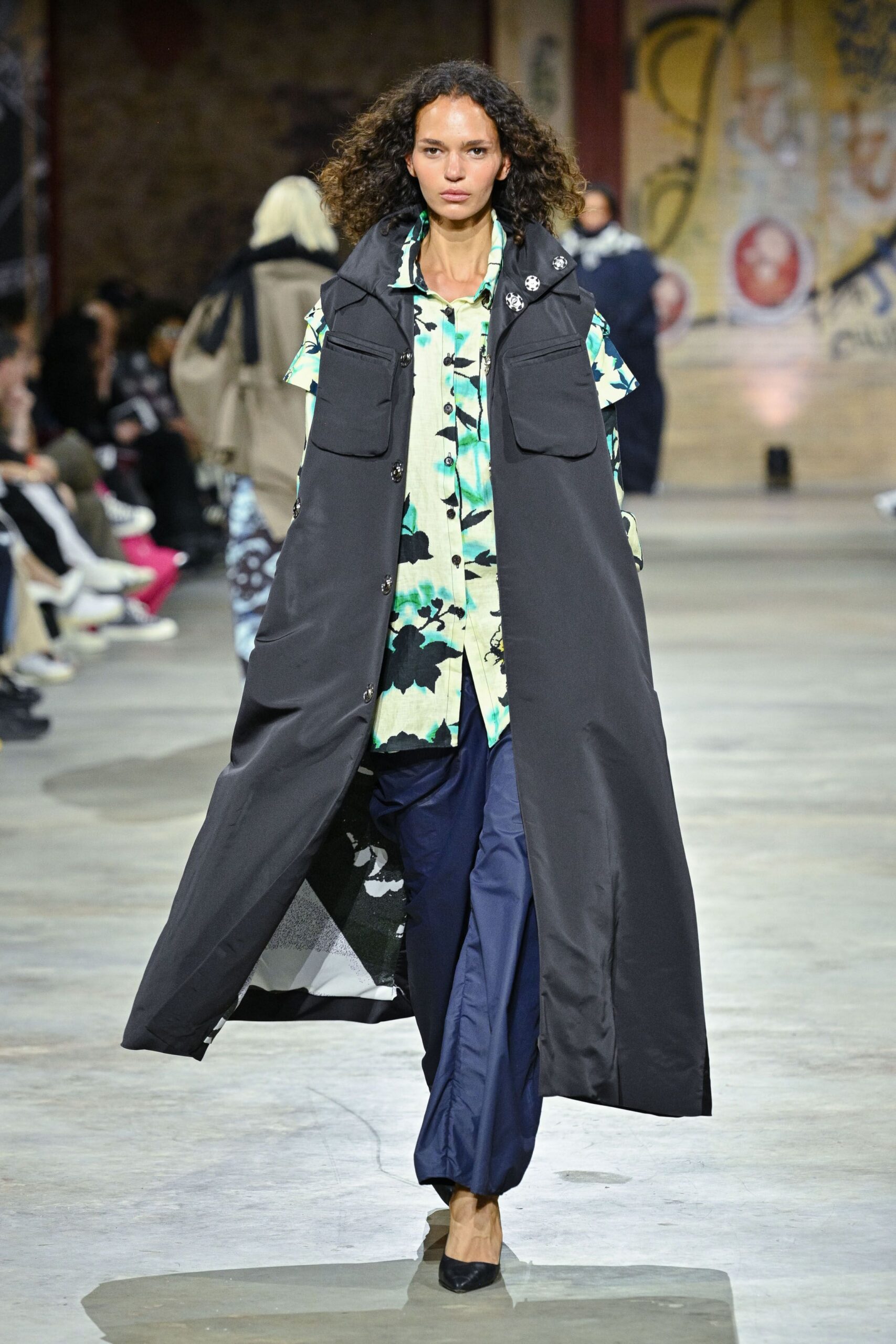 black coat with floral shirt