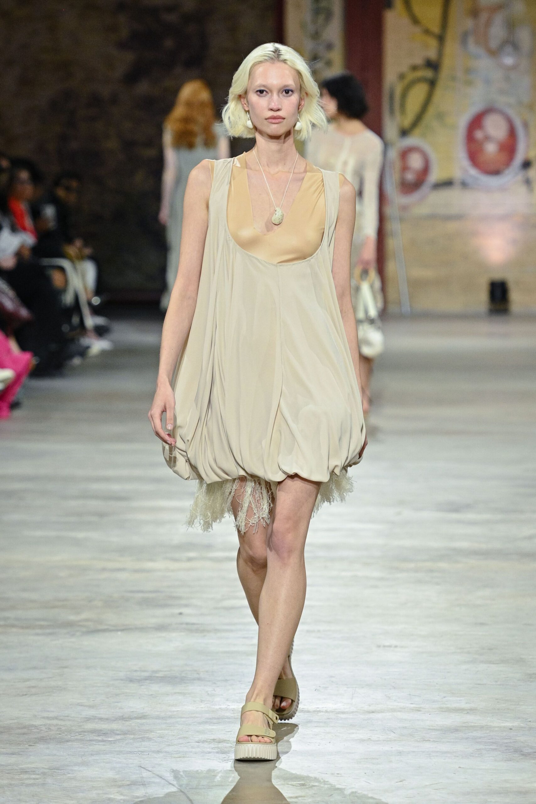 beige silk sleeveless v-neck relaxed pleated flowing dress
