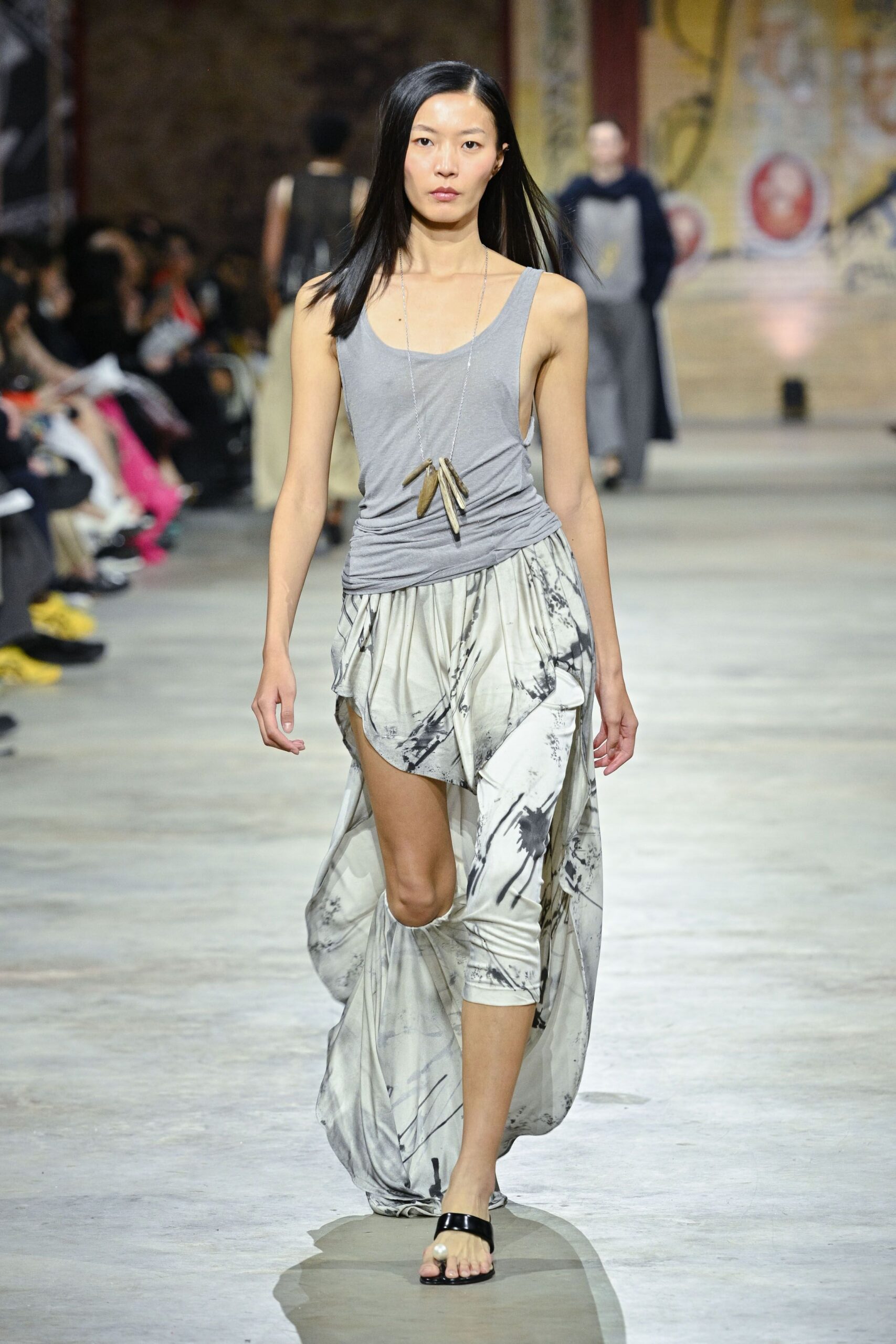 gray tank-top and white layered skirt