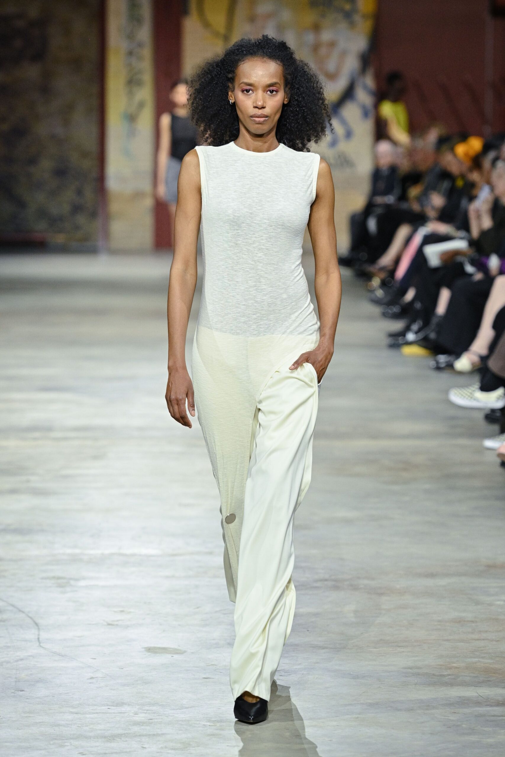 white fitted sleeveless jumpsuit