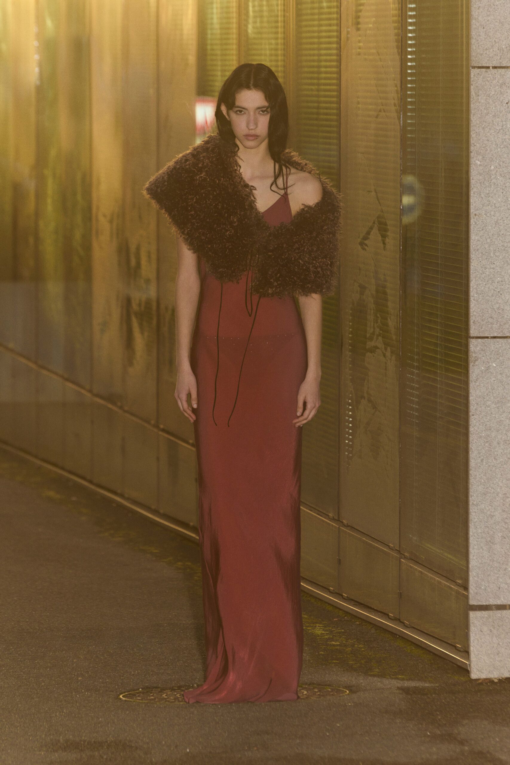 red silk sleeveless v-neck fitted draped flowing gown