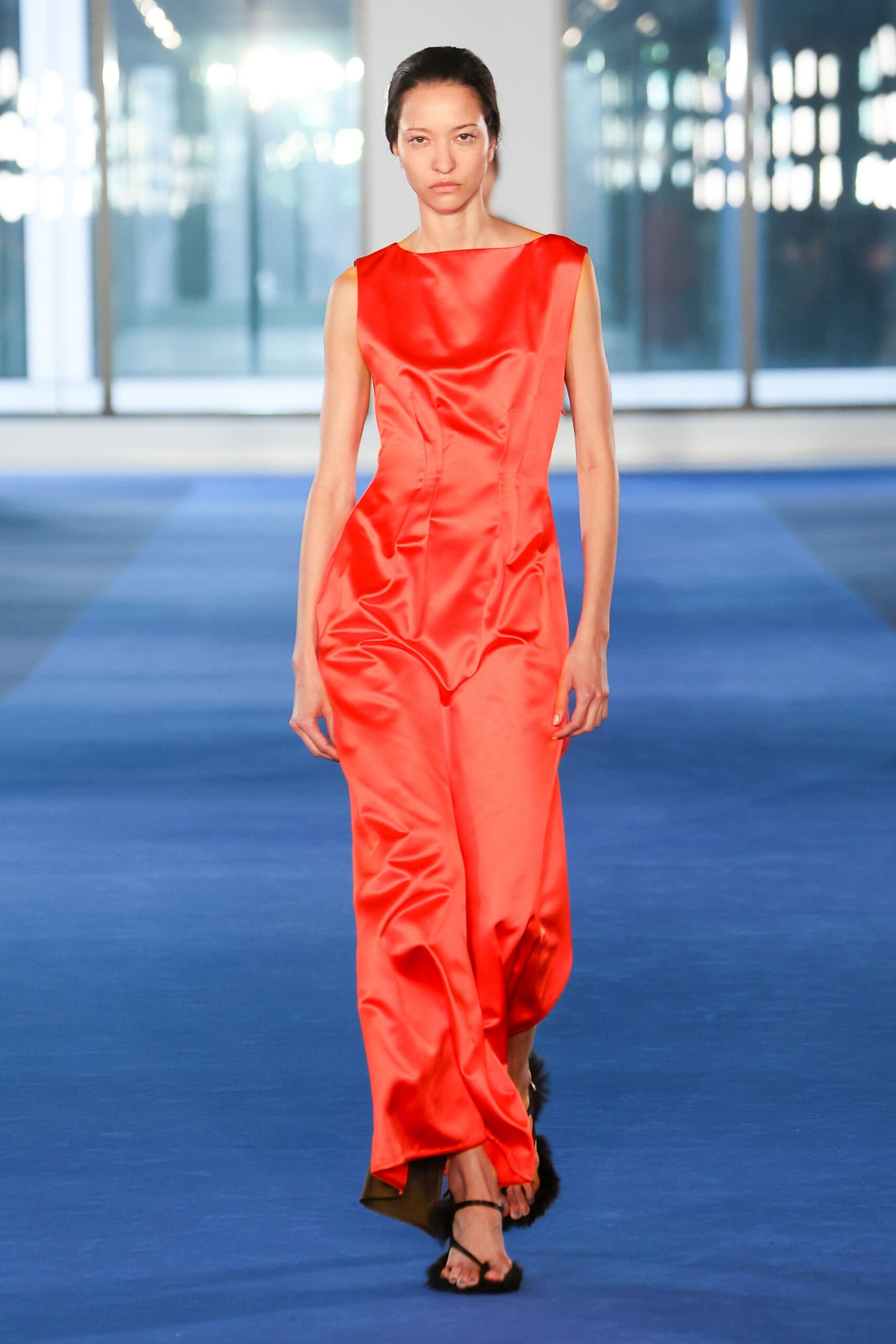 red satin sleeveless high-neck fitted draped shiny gown