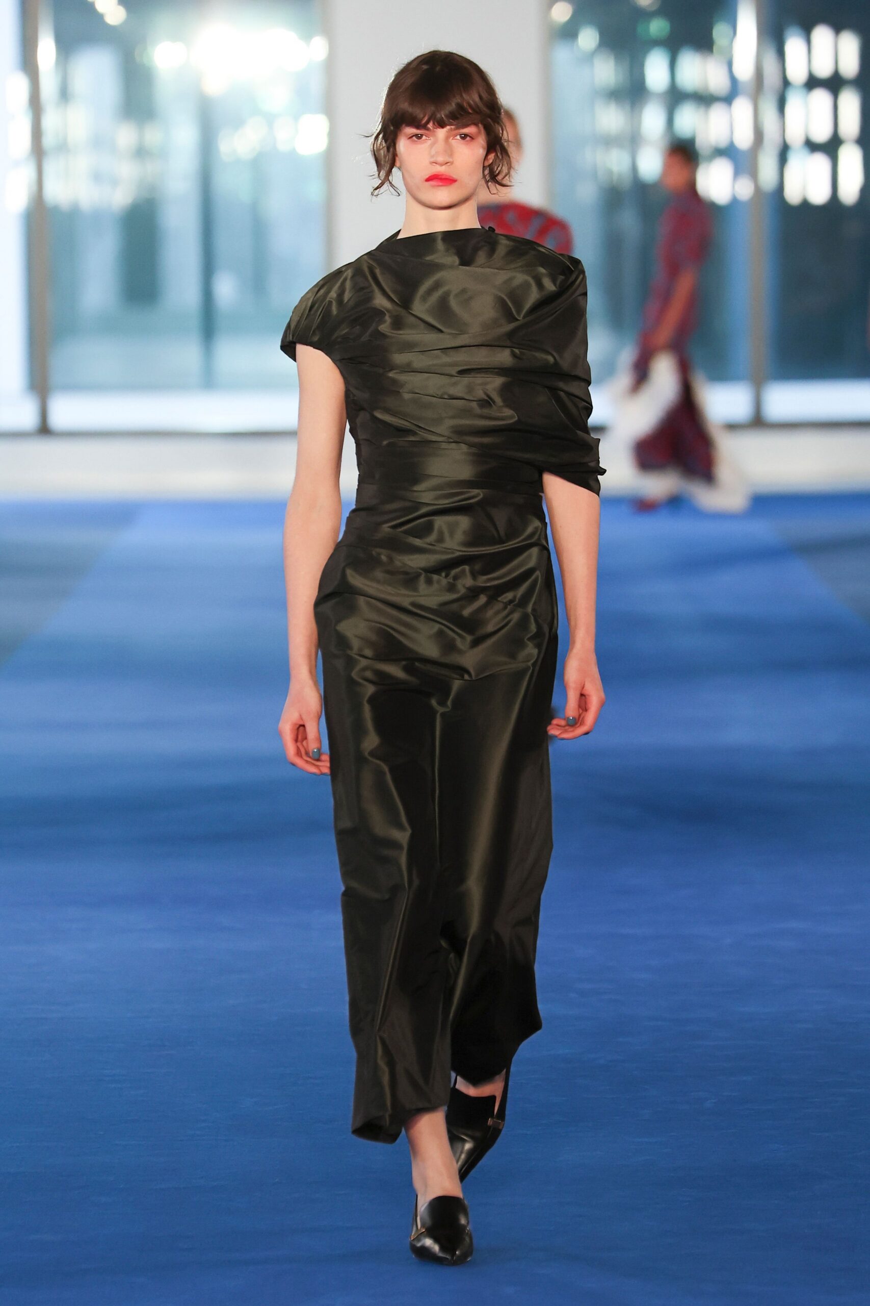 black silk sleeveless high-neck fitted draped flowing dress