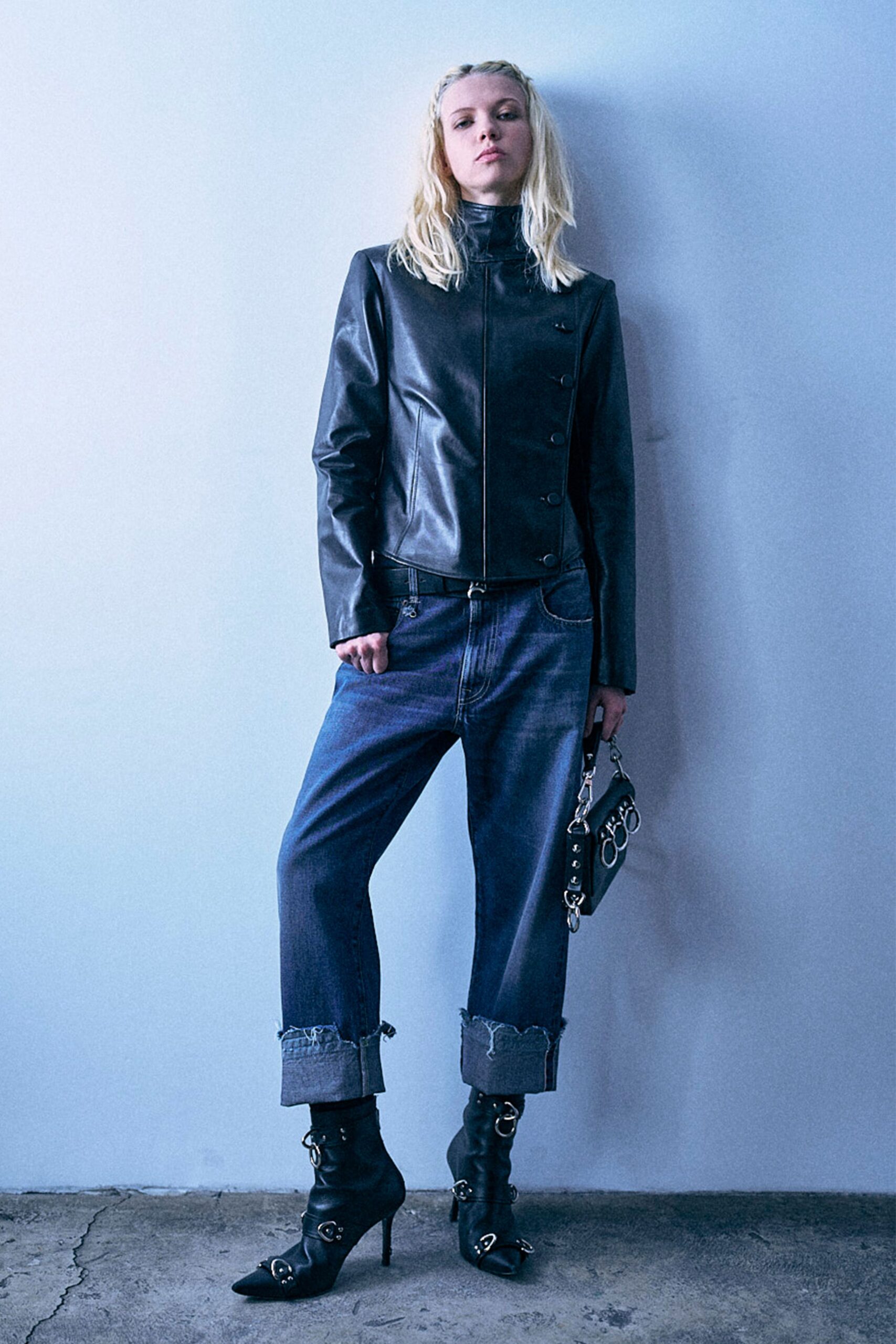 black leather long-sleeve collared fitted buttoned jacket
