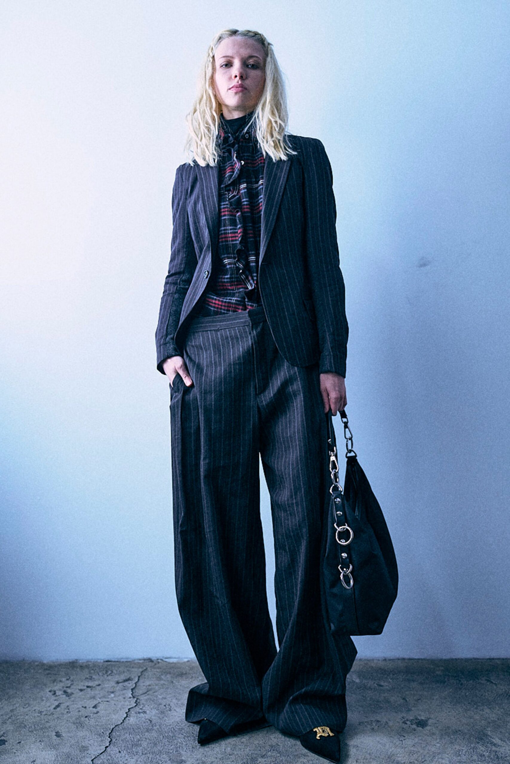 black wool long-sleeve collared tailored striped buttoned suit