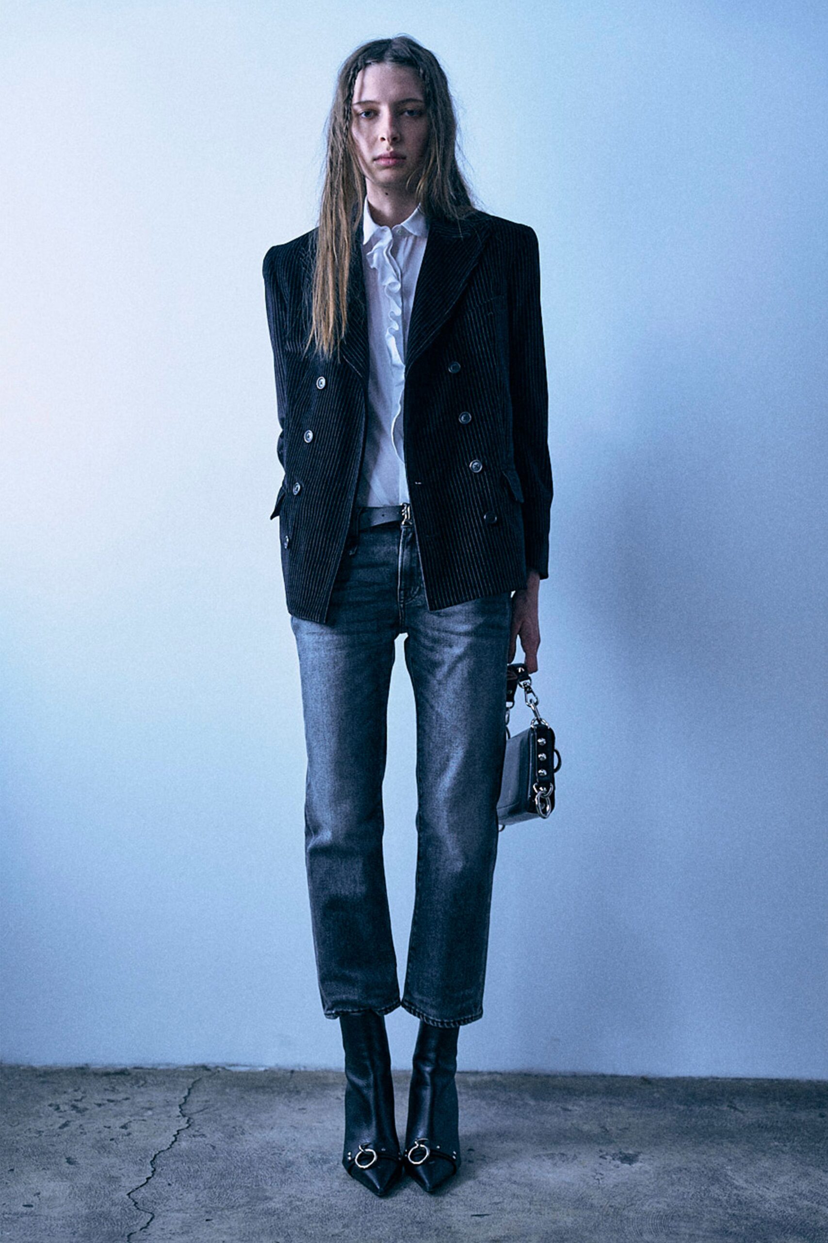 black cotton long-sleeve collared structured pleated blazer