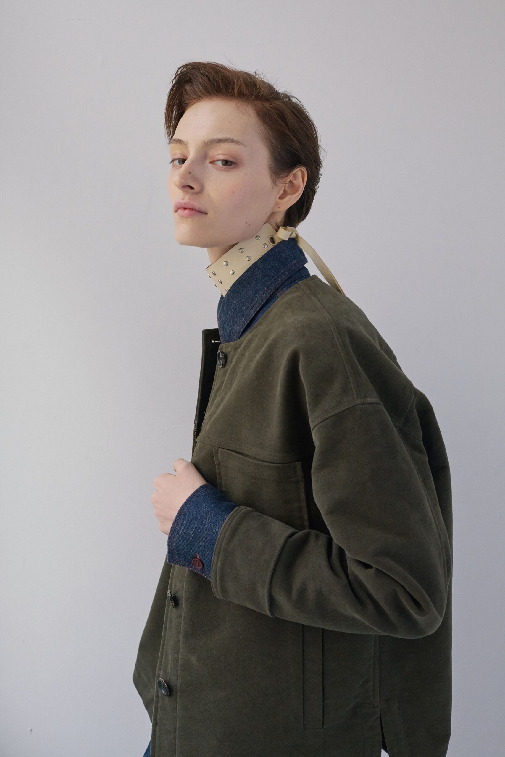 green jacket with denim shirt