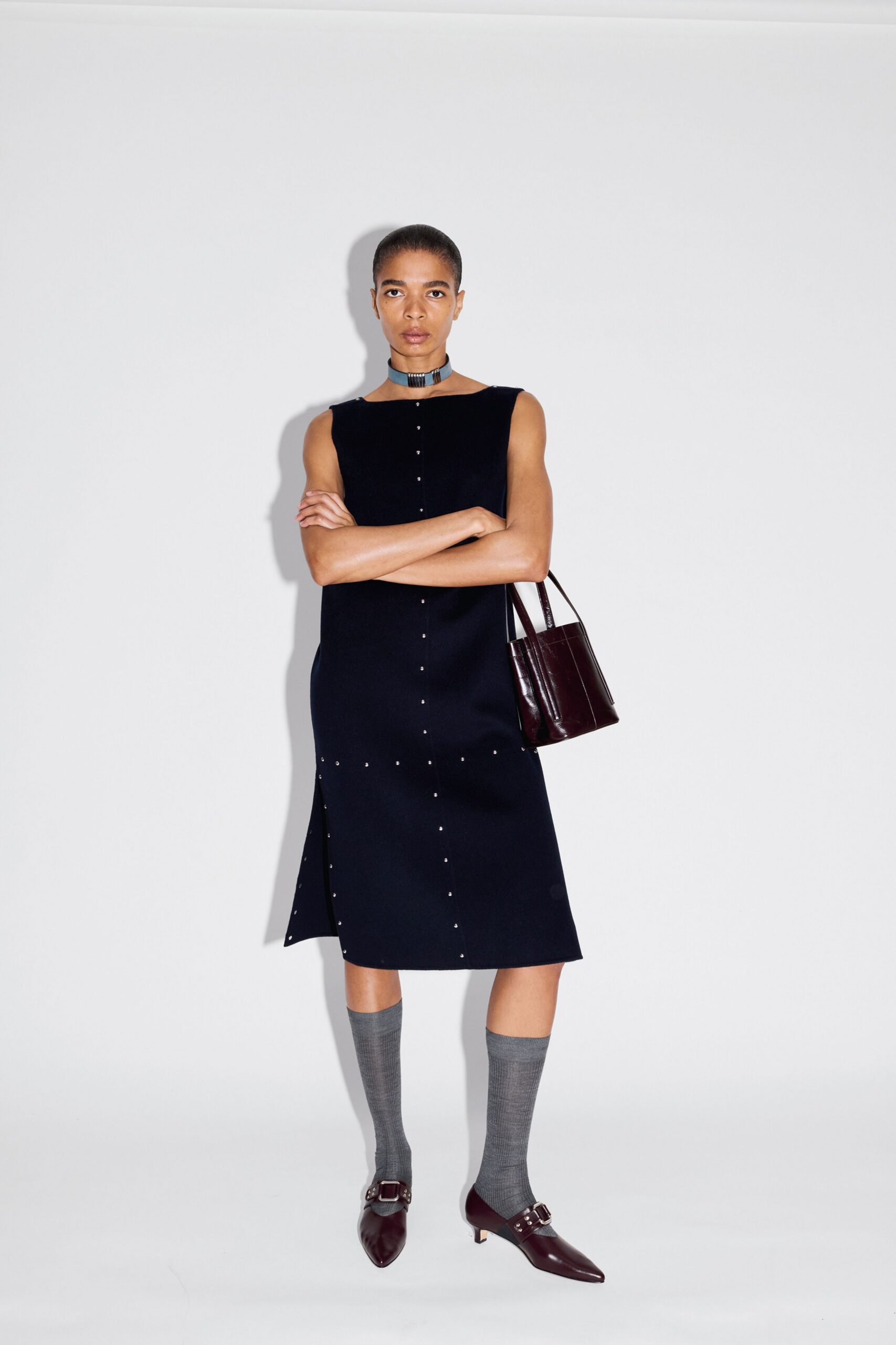 black wool sleeveless high-neck fitted buttoned midi dress